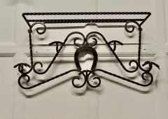 French Wrought Iron Wall Hanging Rack for Coats and Tack on a Horse Riding Theme