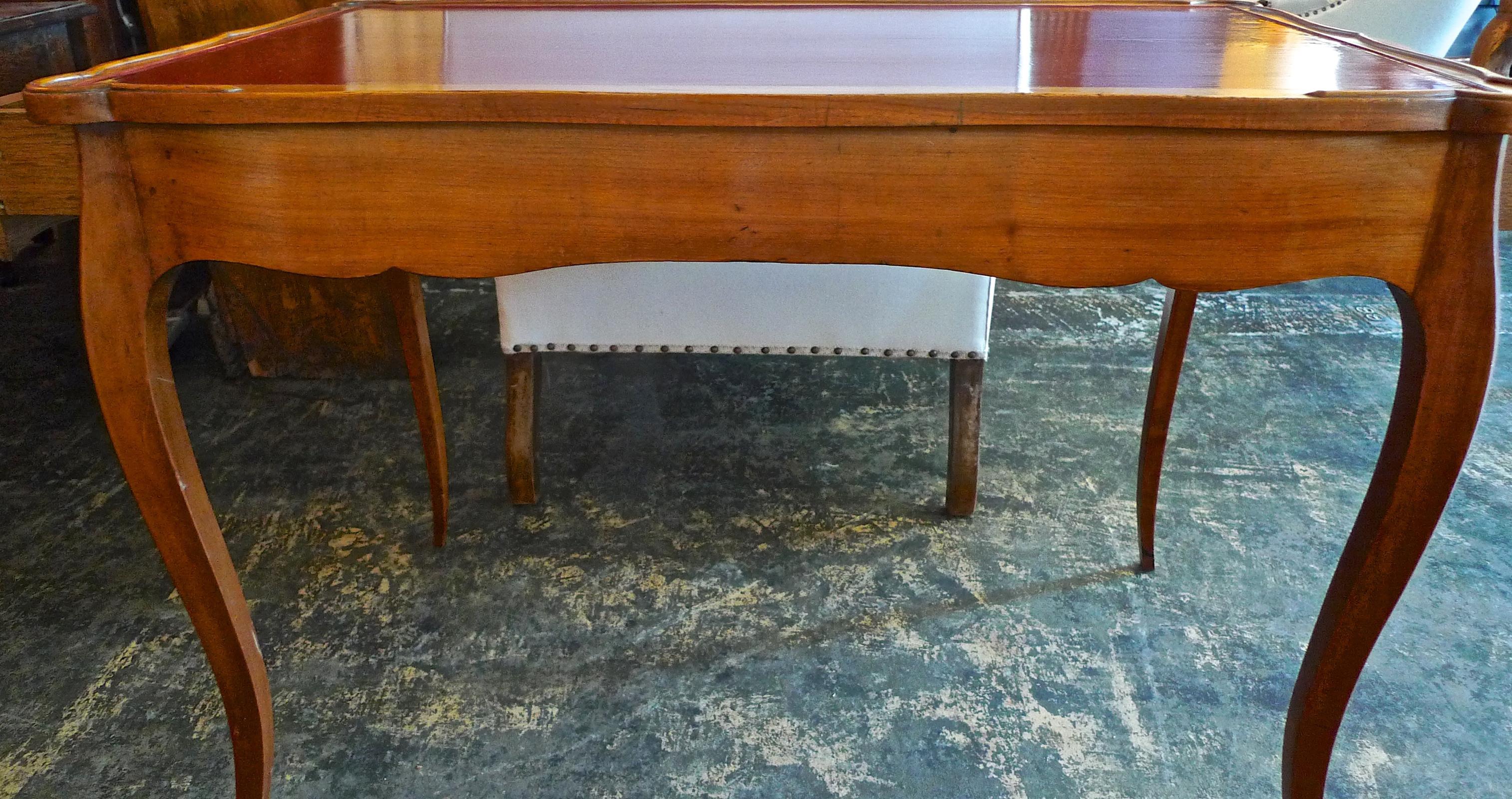 French 19th century handcrafted hand painted fruitwood game table or desk with two large end drawers.