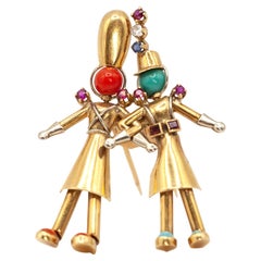 Clip da pelliccia francese Yaeche Freres in oro 18 carati con diamante, corallo, turchese, zaffiro e rubino