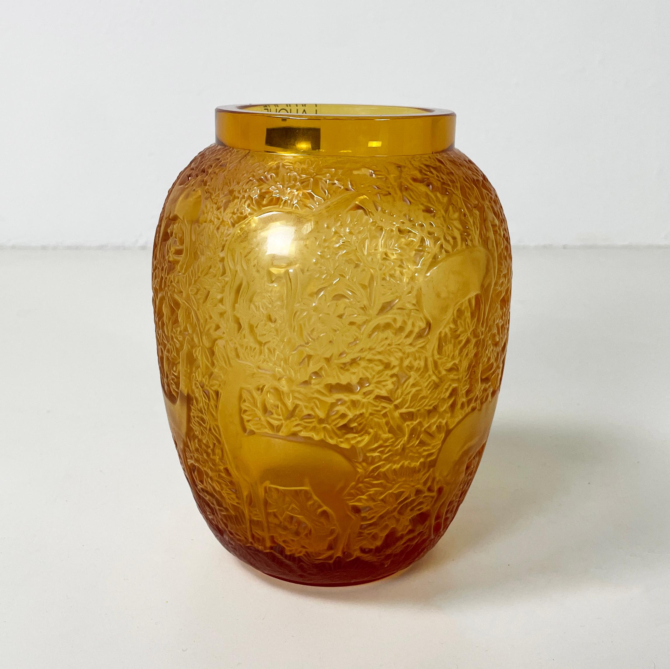 Italian French Yellow glass vase with relief of deer and wood by Lalique, 1900-1990s