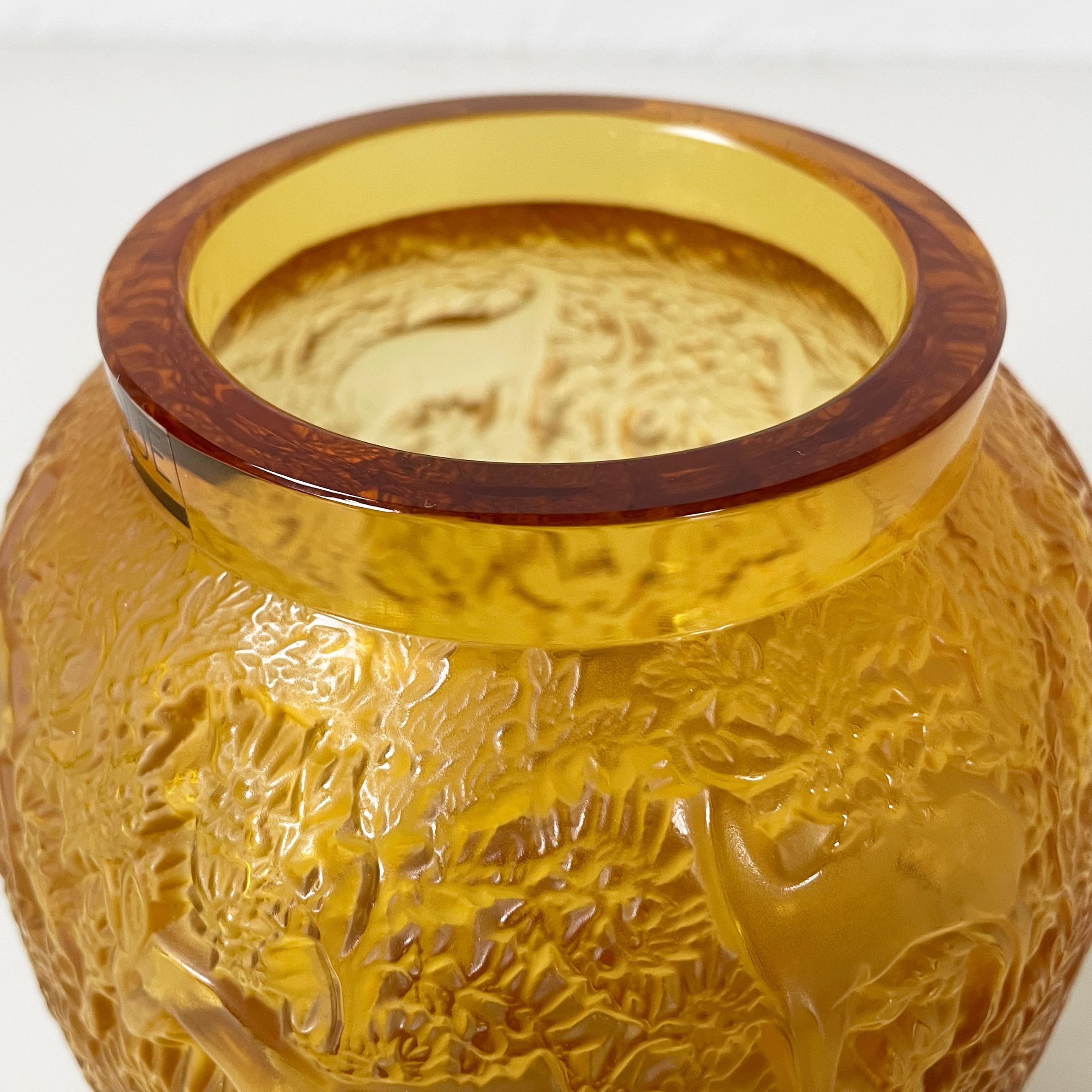 Glass French Yellow glass vase with relief of deer and wood by Lalique, 1900-1990s