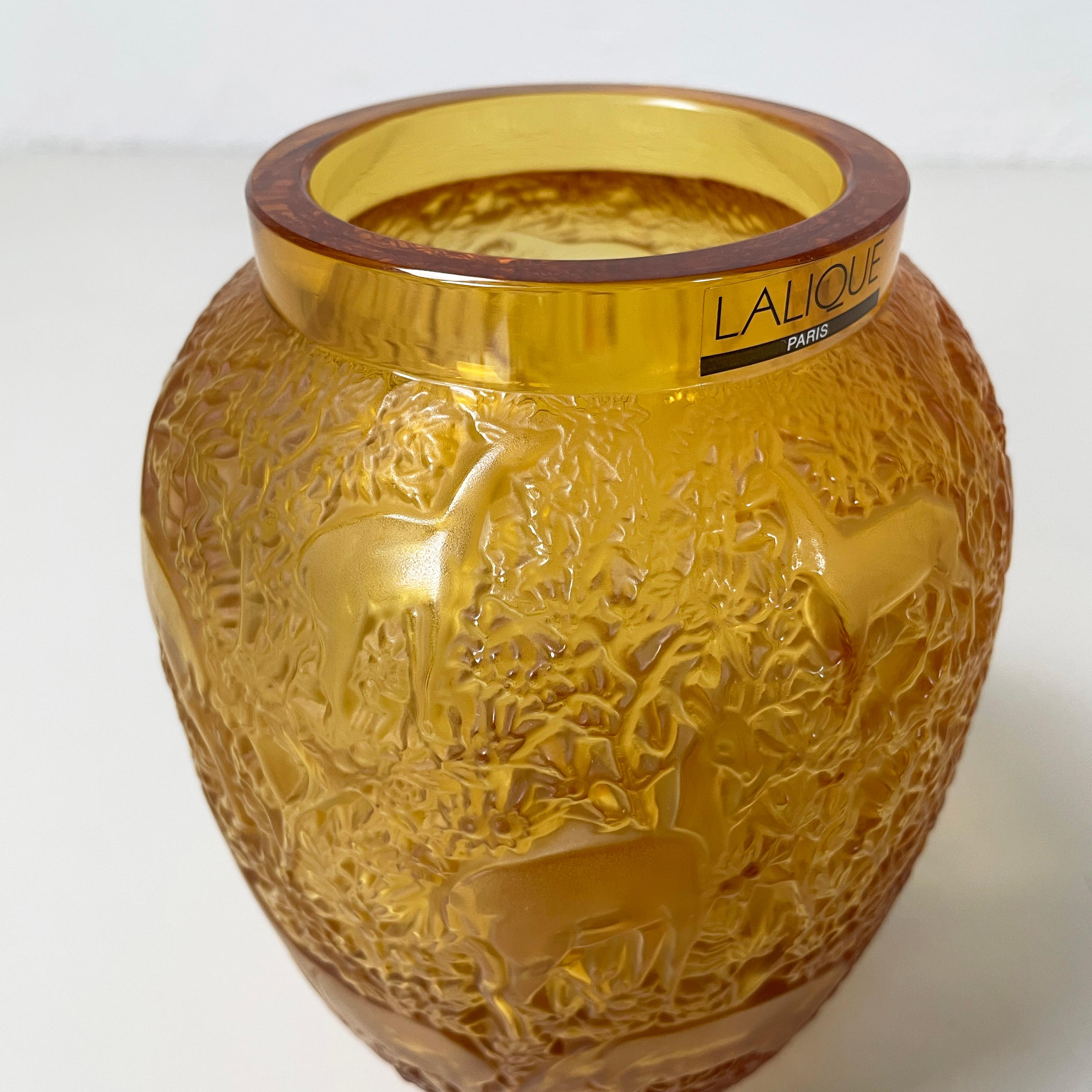 French Yellow glass vase with relief of deer and wood by Lalique, 1900-1990s 1