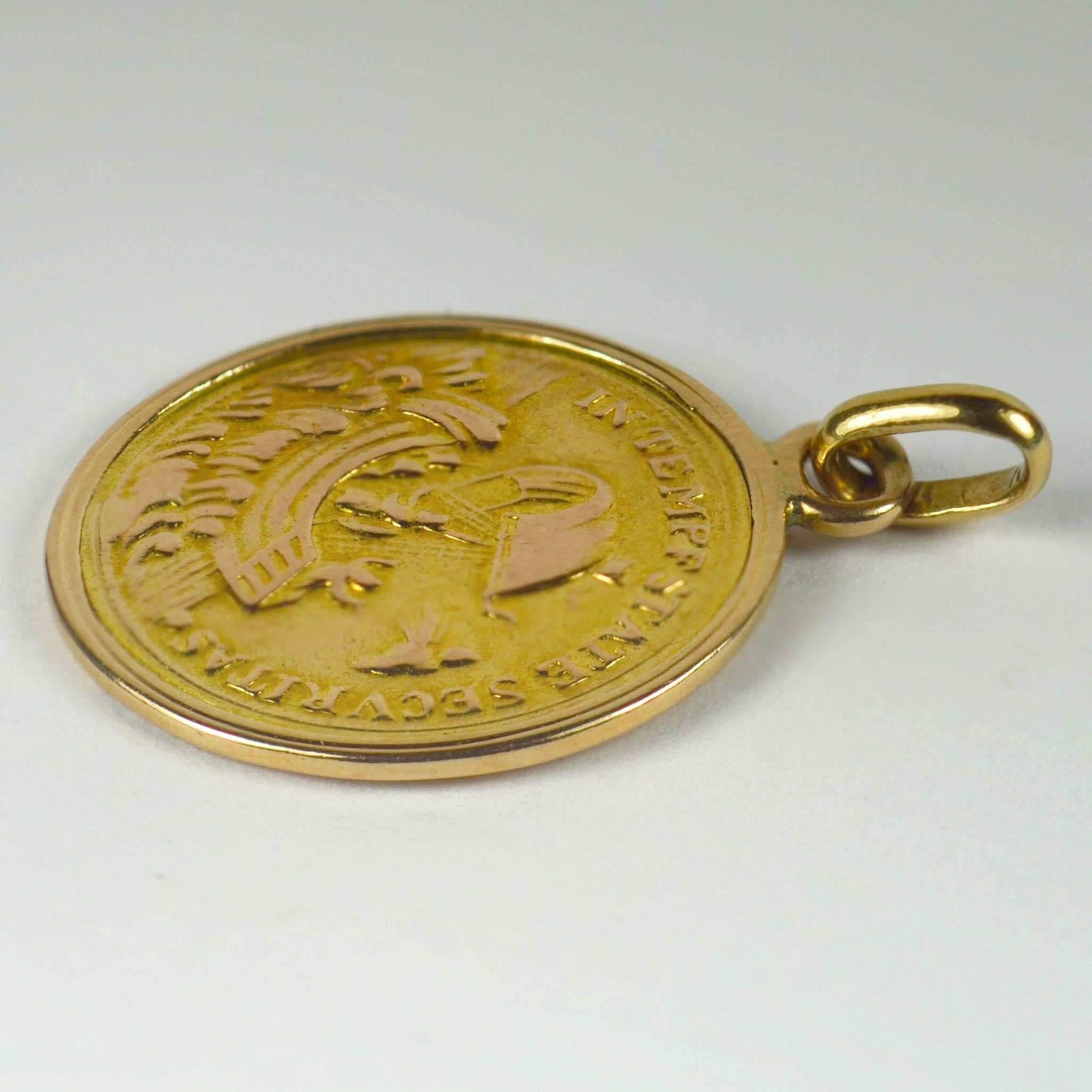st george gold pendant