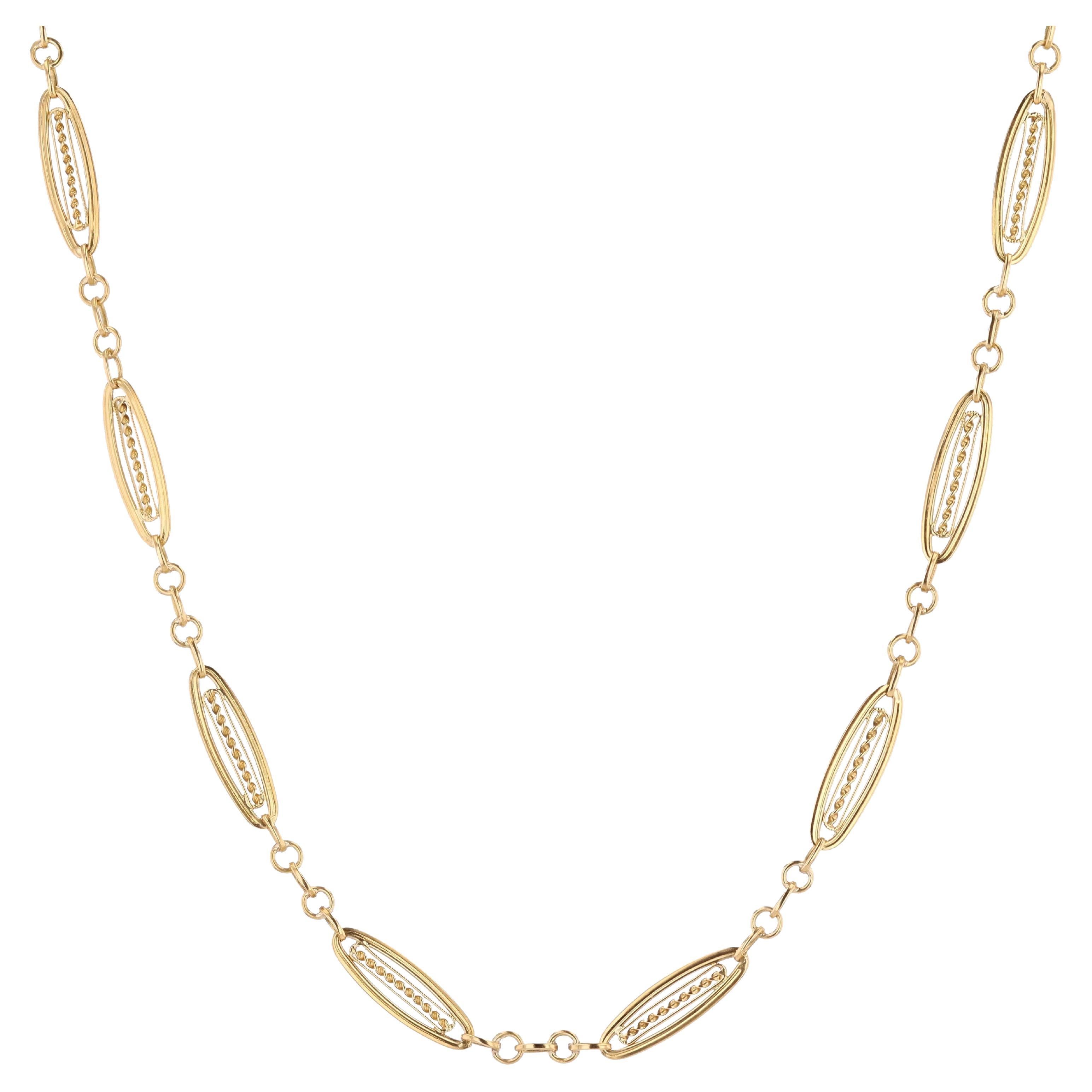 Collar francés de cadena de reloj de oro amarillo de 18 quilates del siglo XX