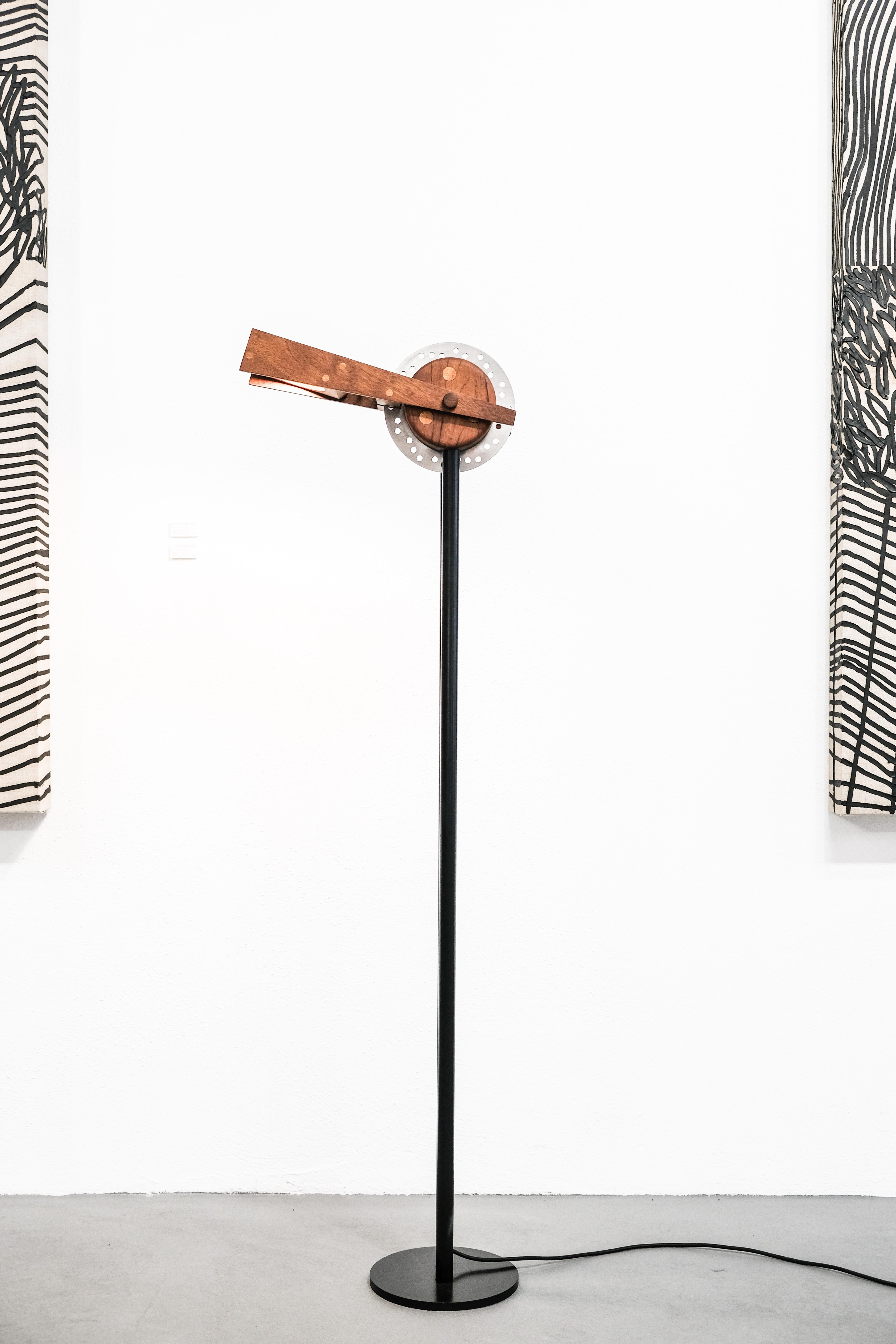 Freno floor lamp by Caio Superchi
Dimensions: D 40 x W 22 x H 160 cm 
Materials: Steel, Wood, Ceramic

All our lamps can be wired according to each country. If sold to the USA it will be wired for the USA for instance.

The challenge was: How