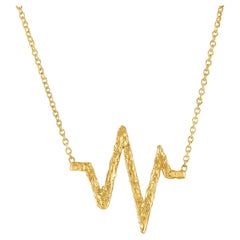 Frequency Symbol Necklace in 22k Gold, by Tagili
