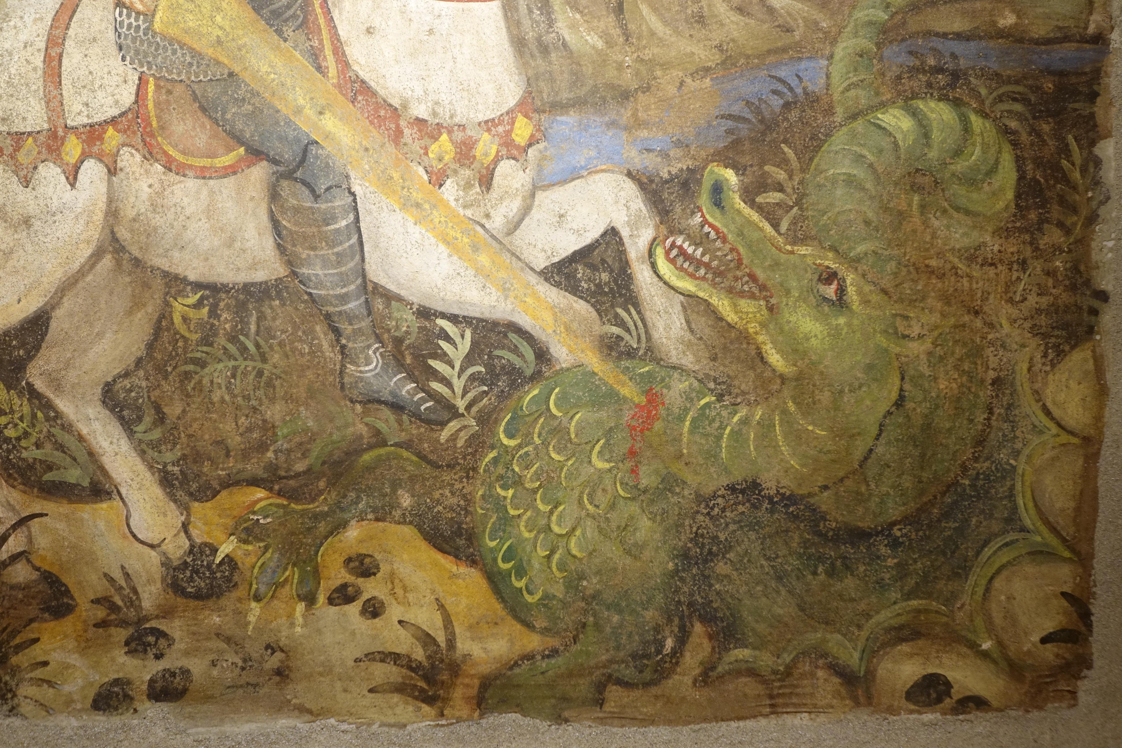 Rare fresco depicting St. George slaying the dragon under the walls of Silenus, in the Roman province of Libya.
St. George of Lydda, born in 280 in Mazaca, Cappadocia, and canonized in 494, is a holy saroctone, known for having slain the dragon