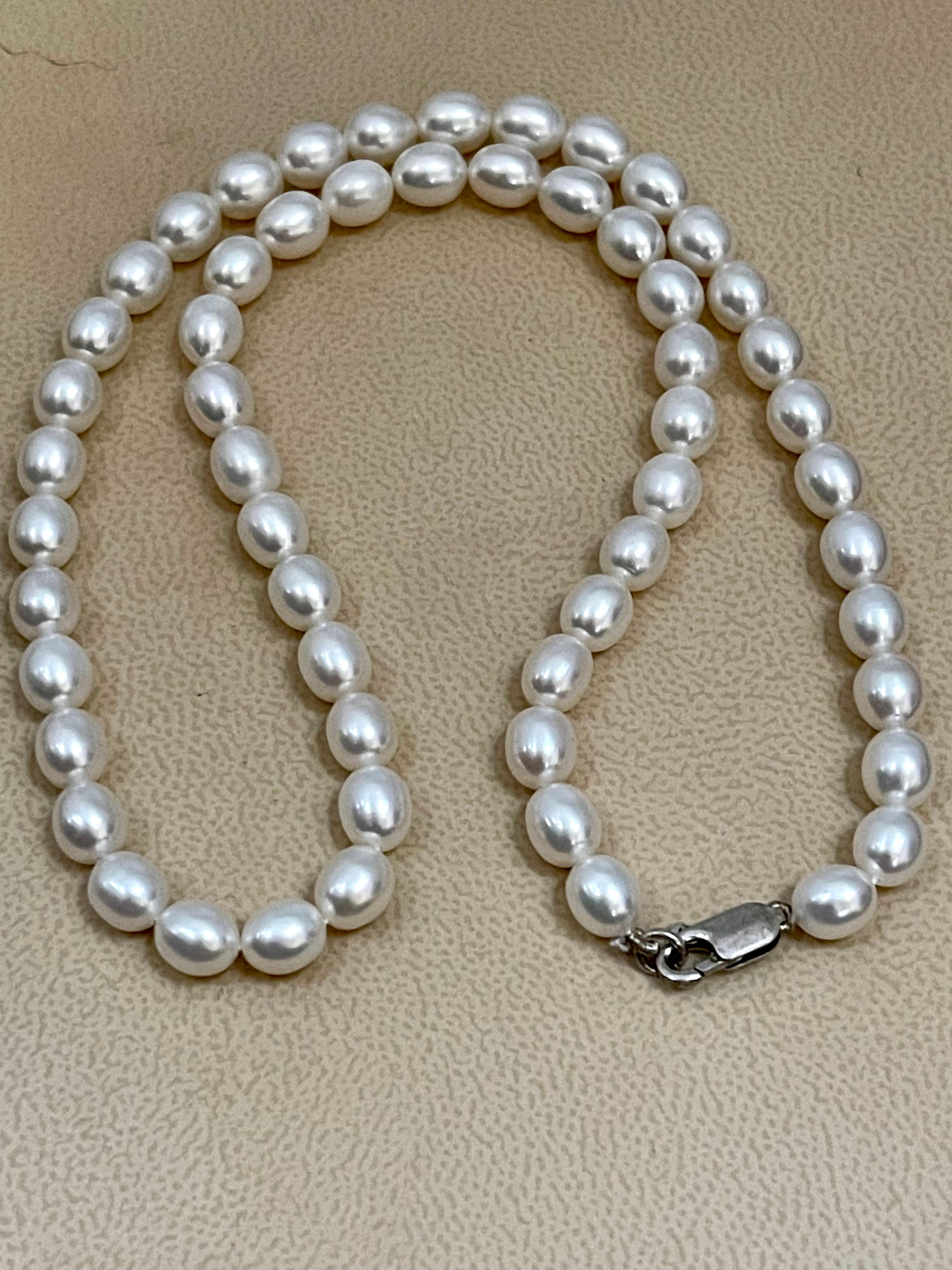 Round Cut Fresh Water Elongated Pearl Single Strand Necklace, Silver Clasp For Sale