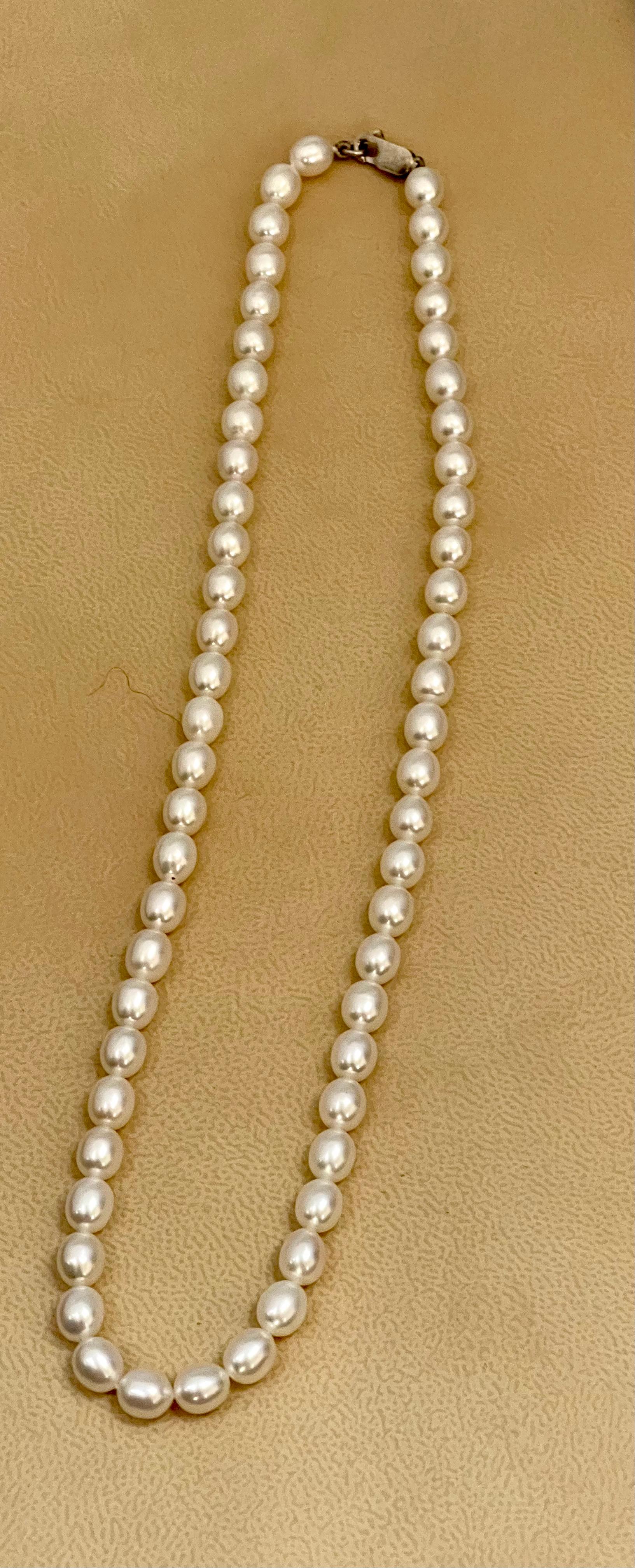 Fresh Water Elongated Pearl Single Strand Necklace, Silver Clasp In Excellent Condition For Sale In New York, NY