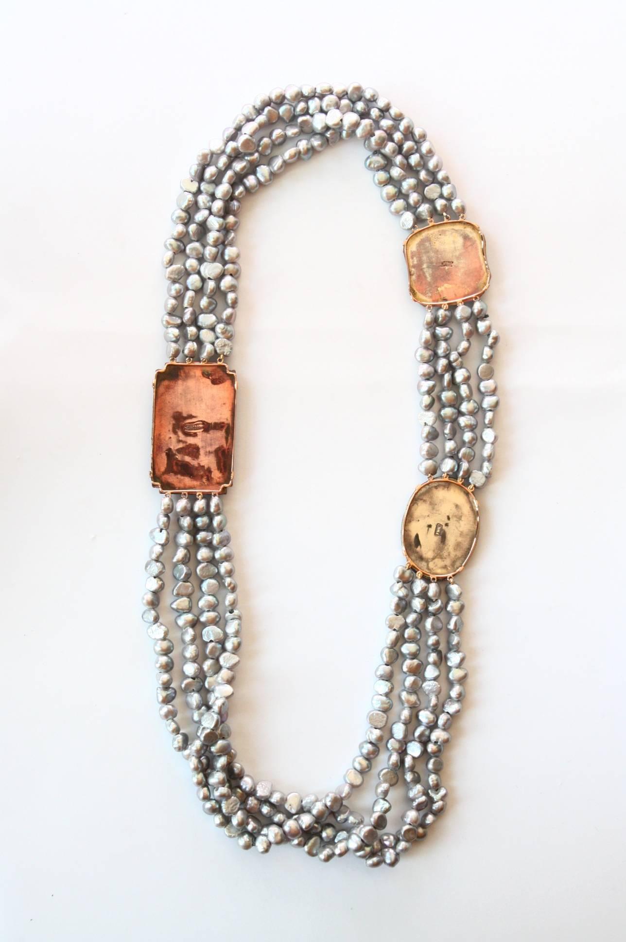 Very special grey  fresh water long necklace with 3 different antiques Chinese '900 pin in lacquer and enamel as a decoration, gold 7,90 gr , length 70cm.
All Giulia Colussi jewelry is new and has never been previously owned or worn. Each item will