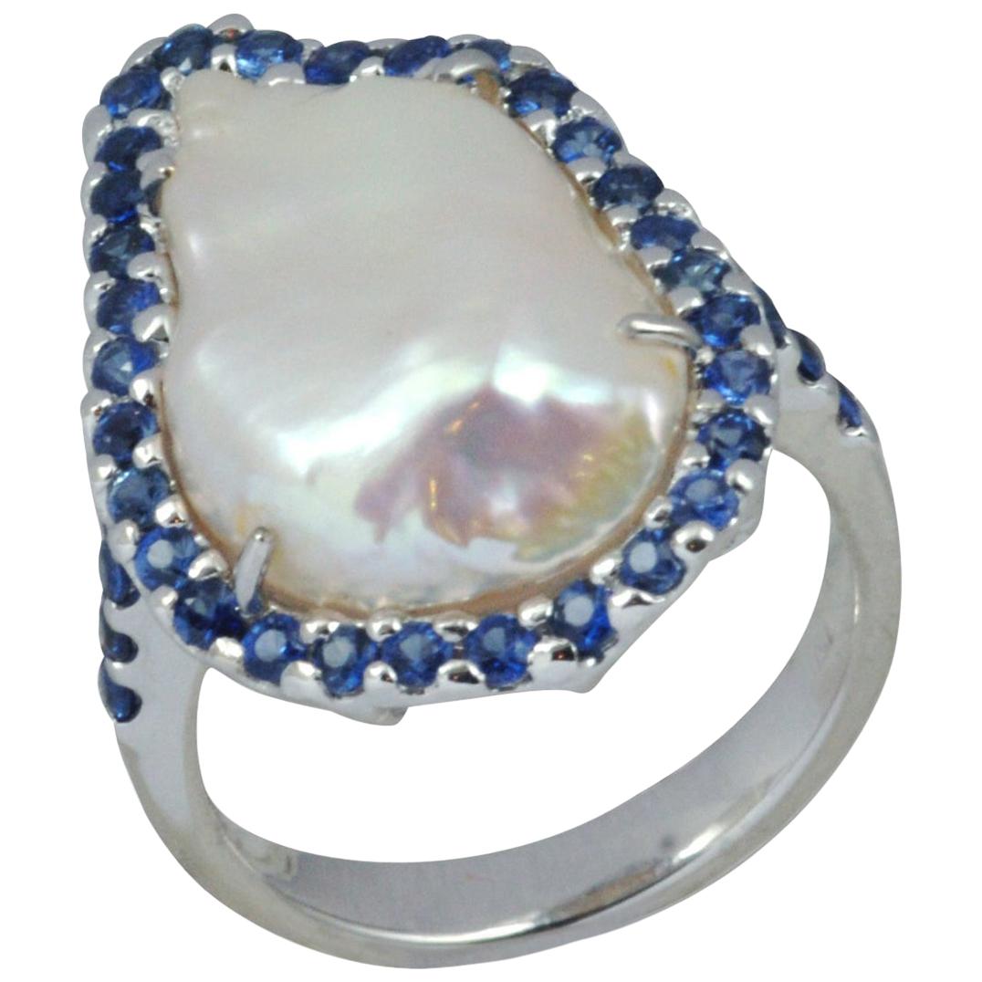 Fresh Water Pearl, Blue Sapphire 1.03 Carat Ring in 18 Karat White Gold Settings For Sale