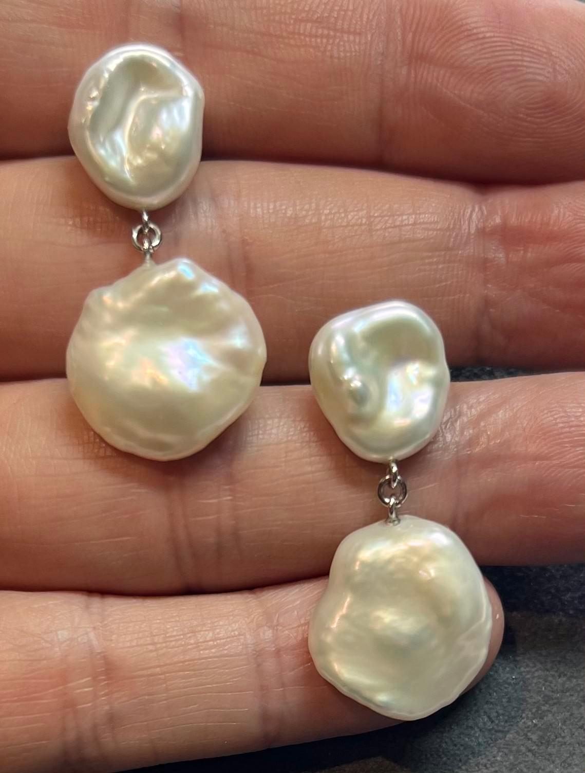 Fine Quality Fresh Water Pearl Dangle Earrings 14k White Gold Certified $799 018542

This is one of Kind Unique Custom Made Glamorous Piece of Jewelry!

Nothing says, “I Love you” more than Diamonds and Pearls!

This item has been Certified,