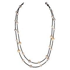 Fresh Water Pearl Single Strand Necklace with Black Spinel Opera Length 46 Inch