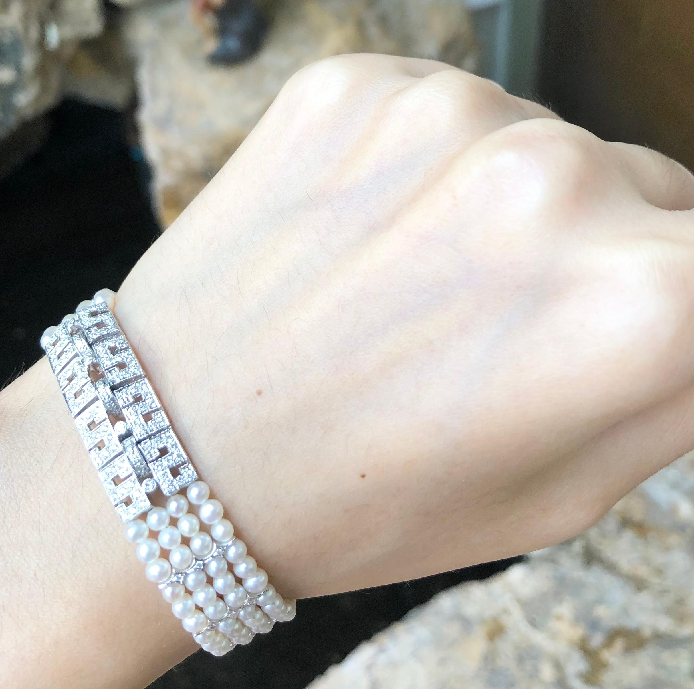 Women's Fresh Water Pearl with Diamond 0.75 Carat Bracelet Set in 18 Karat White Gold Se For Sale