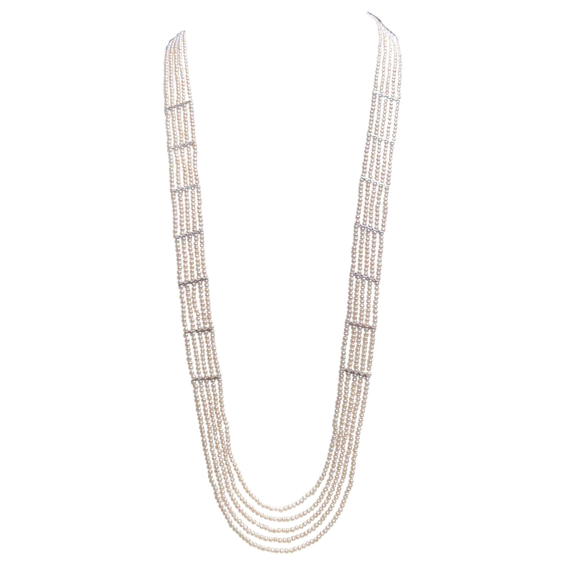 Collana con perle d'acqua dolce e diamanti in oro bianco 18 carati
