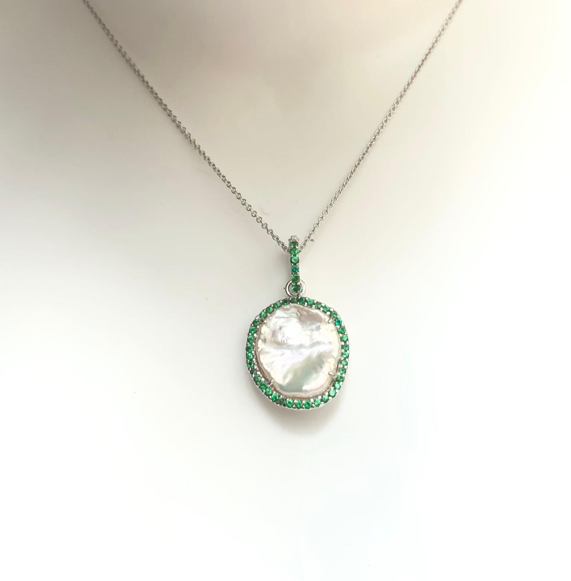 Fresh Water Pearl with Tsavorite 0.75 carat Pendant set in 18 Karat White Gold Settings
(chain not included)

Width:  1.9 cm 
Length: 3.1 cm
Total Weight: 5.84 grams

