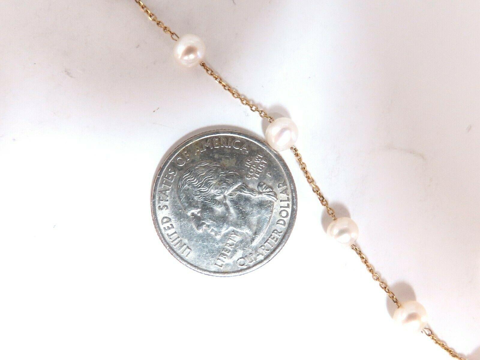 5.collier de perles d'eau douce naturelles de 6 mm
Qualité AAA

 16 pouces de long.

or jaune 14kt

Poids total : 4,9 grammes