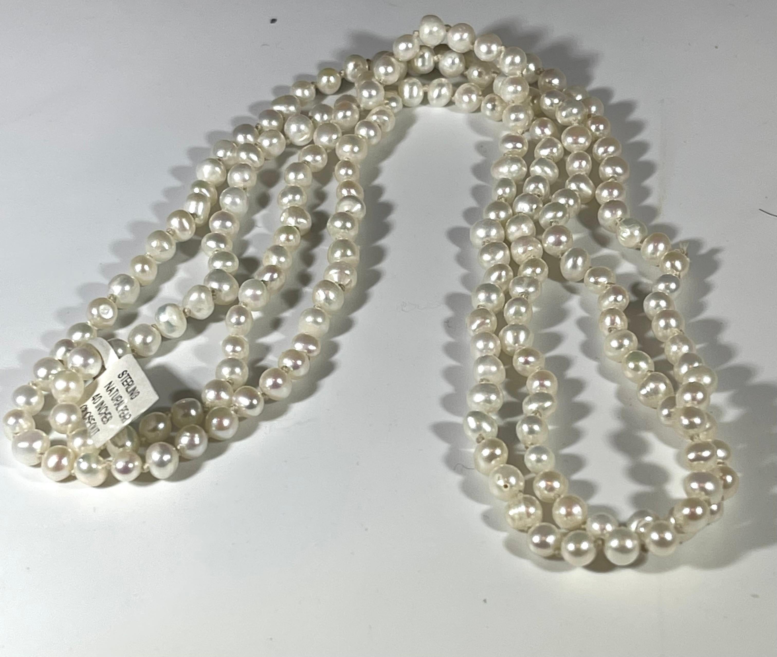 Fresh Water Round Pearl Single Strand Necklace, Opera Length In Excellent Condition For Sale In New York, NY