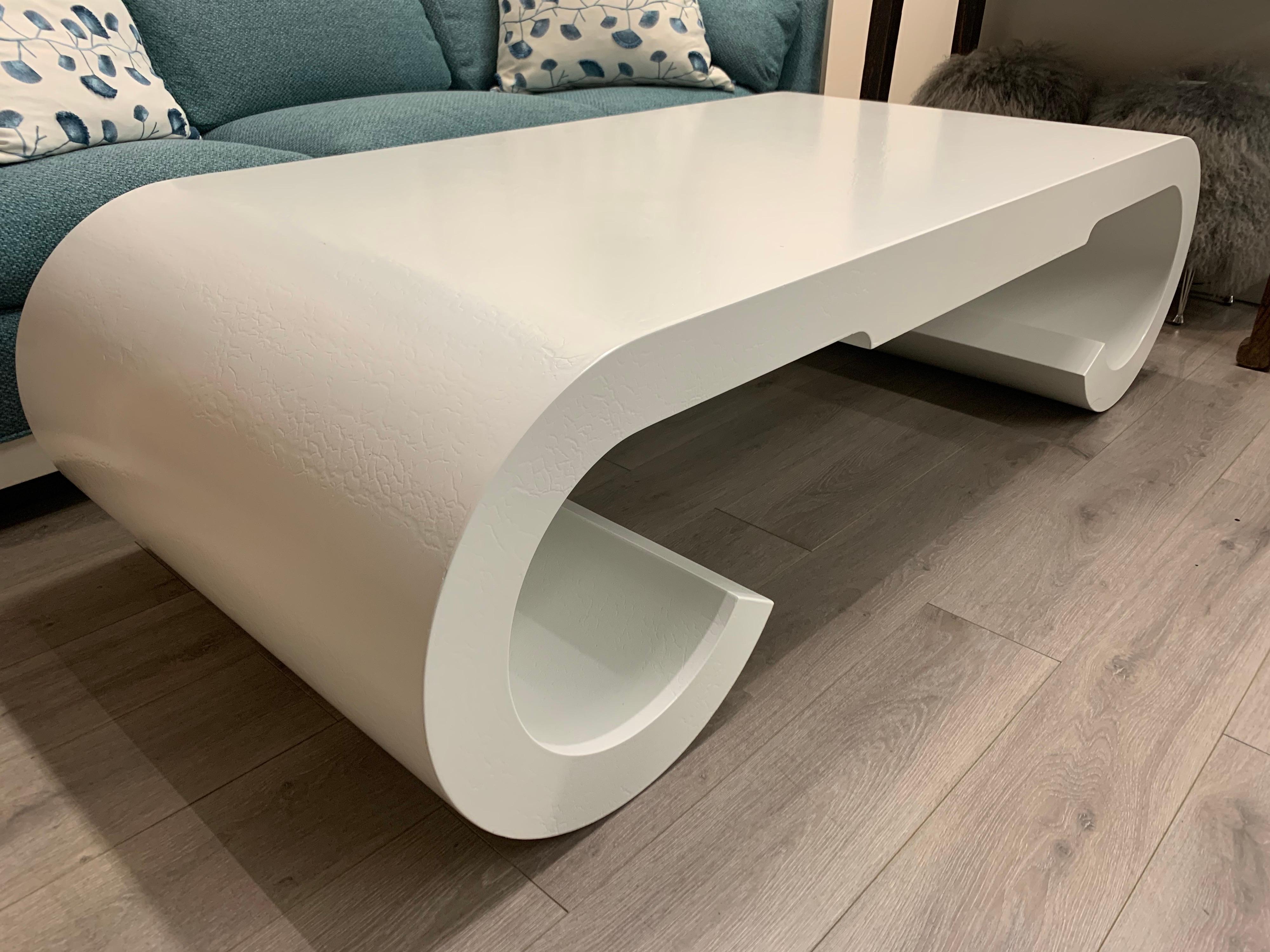 Stunning, large newly lacquered white sculptural cocktail table. Great scale
and better lines. Now, more than ever, home is where the heart is.