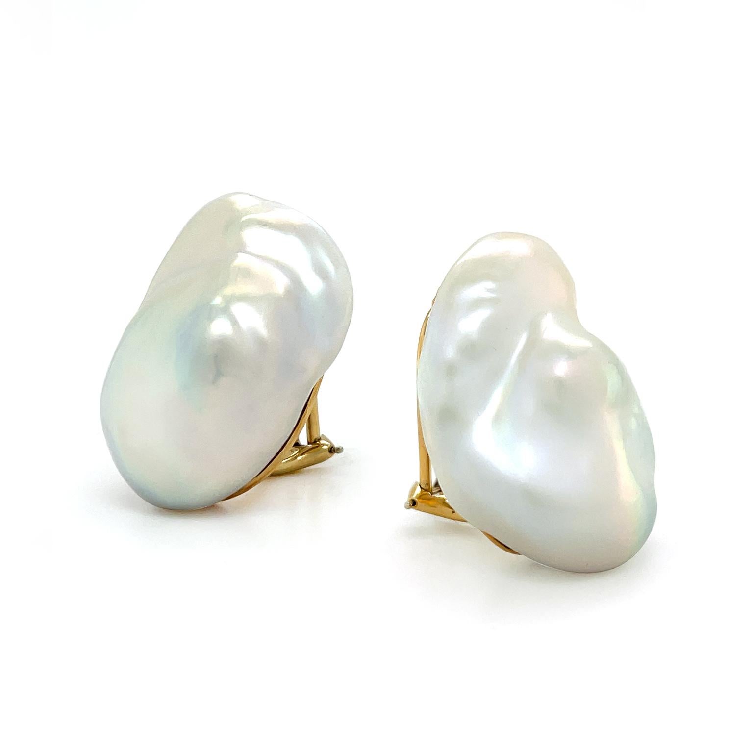 The chromatic singularity of baroque pearls is demonstrated in these earrings. Prized for their unique shapes, each of the oval-shaped pearls reflects soft multicolored hues and shadows across their varied valleys. The total weight of the pearls is