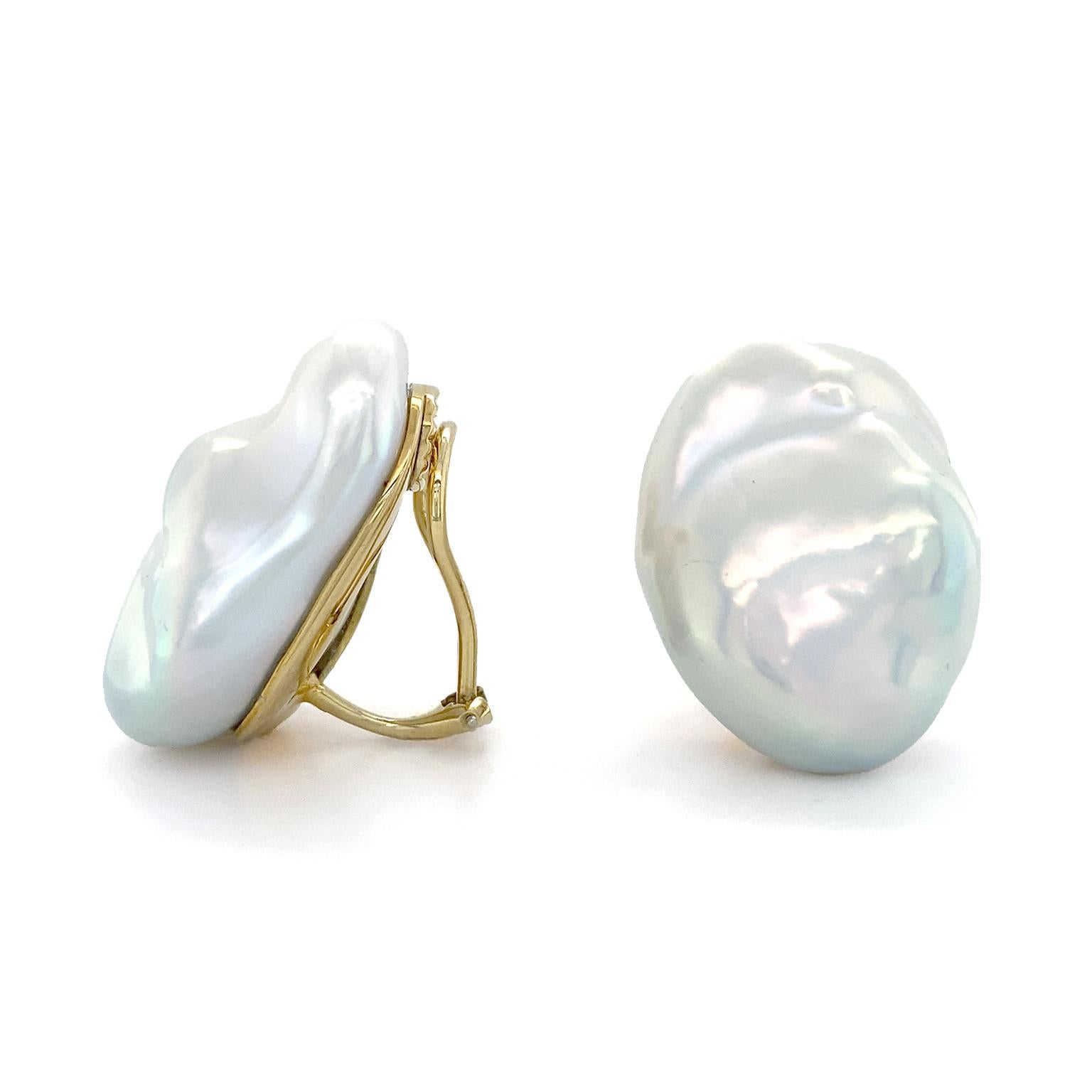Iridescence make these baroque pearl earrings stand out. The freshwater pearls have many layers of hue. Over the bodycolor are sheens of blue, green, gold and more. Baroque’s irregular surfaces allow for varying color concentrations. The backs of