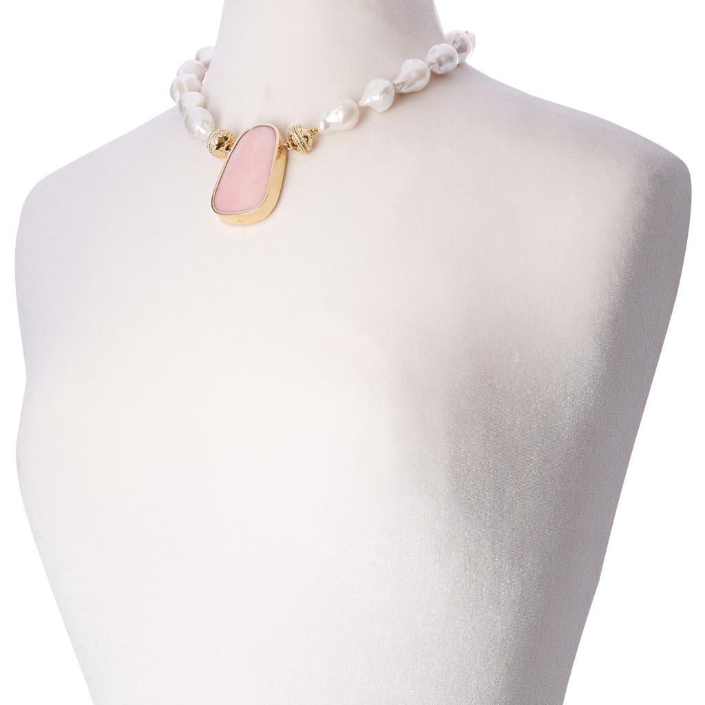 Single strand of beautiful freshwater irregular shaped baroque pearls in shades of white, featuring our signature 14K plated yellow gold magnetic clasp. Each pearl is unique in shape and casts beautiful 