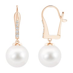 Boucles d'oreilles en or rose 14 carats avec perles de culture d'eau douce et diamants