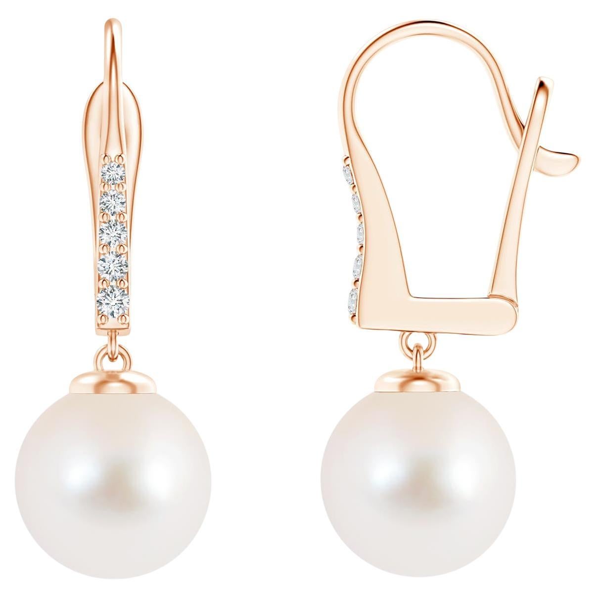Boucles d'oreilles en or rose 14 carats avec perles de culture d'eau douce et diamants en vente