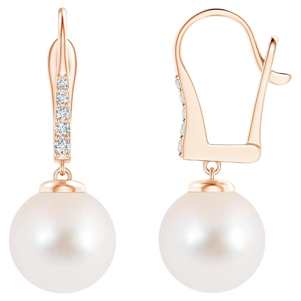 Boucles d'oreilles en or rose 14 carats avec perles de culture d'eau douce et diamants en vente