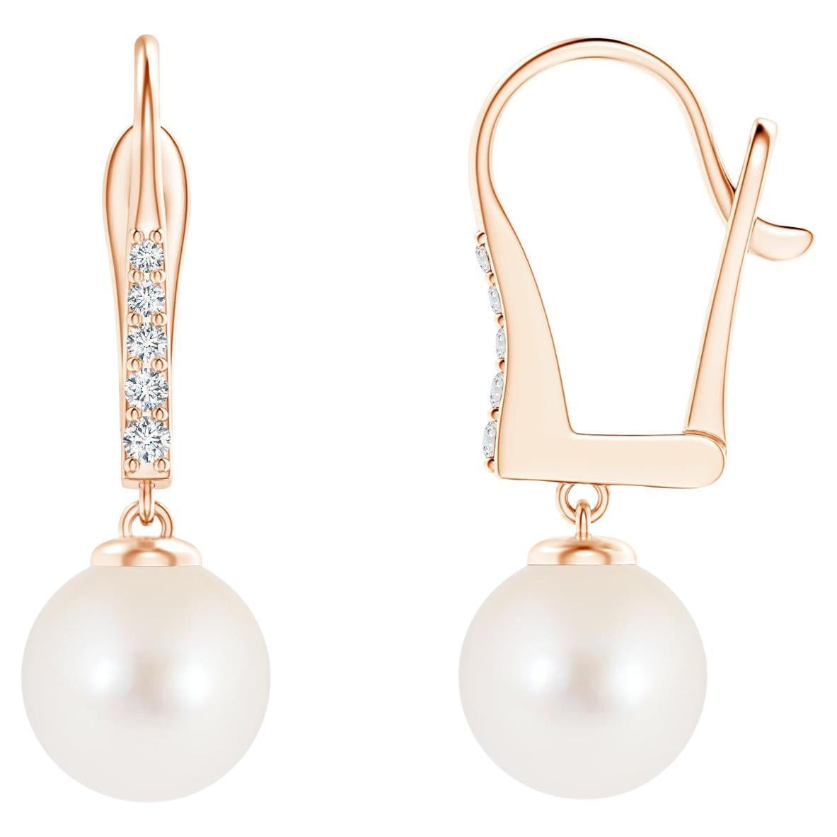 Boucles d'oreilles en or rose 14 carats avec perles de culture d'eau douce et diamants