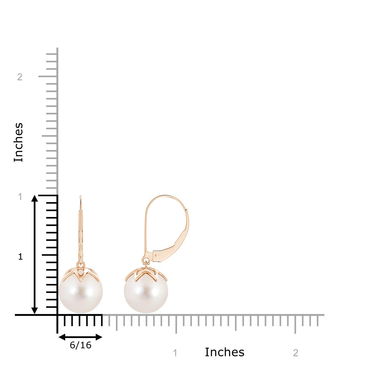 The classic white of the two round peg-set Freshwater cultured pearls is sure to allure. Crafted in 14K rose gold, these dangling pearl earrings will give you a polished look for the day as well as the night. Match these pearl ball drop earrings