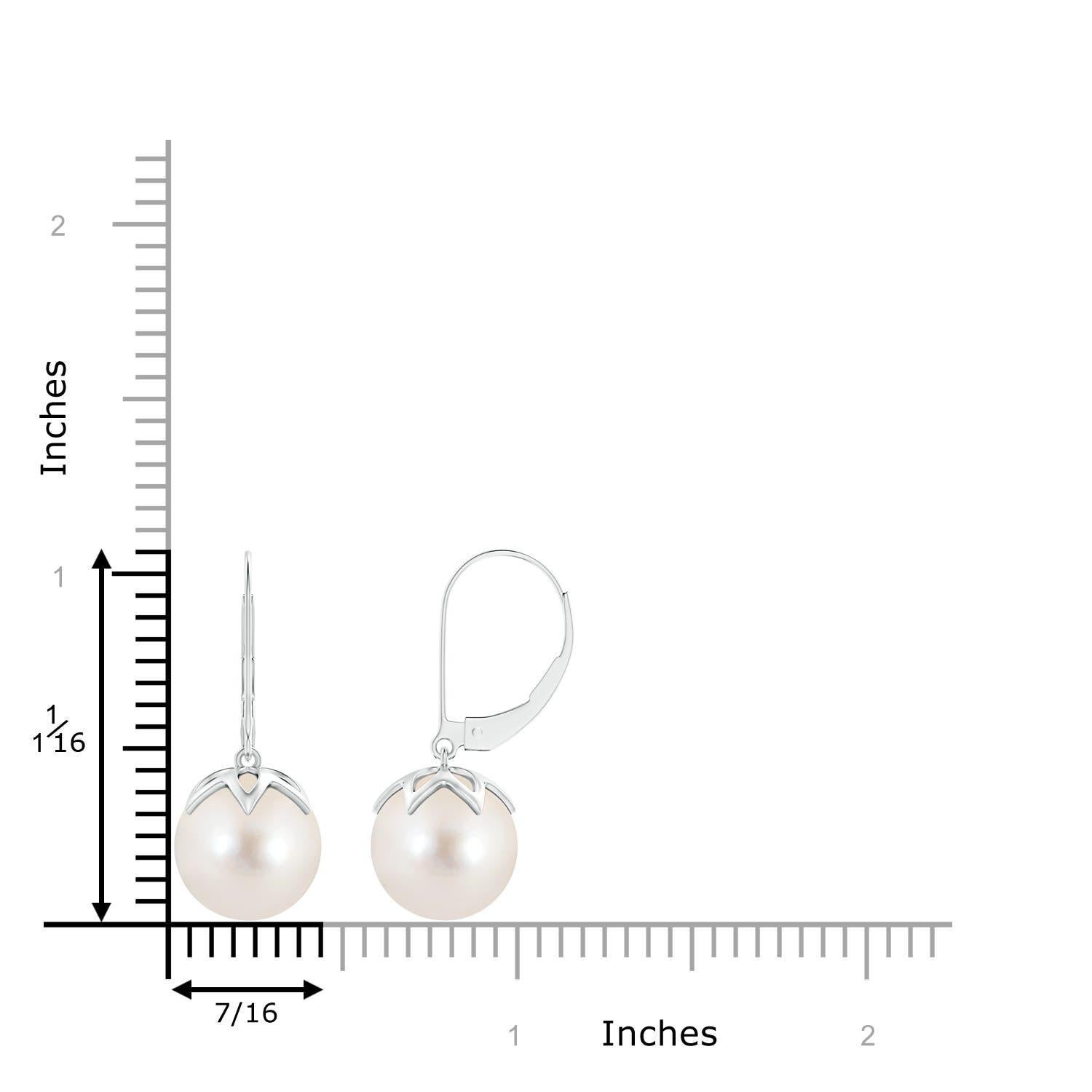 The classic white of the two round peg-set Freshwater cultured pearls is sure to allure. Crafted in 14K white gold, these dangling pearl earrings will give you a polished look for the day as well as the night. Match these pearl ball drop earrings