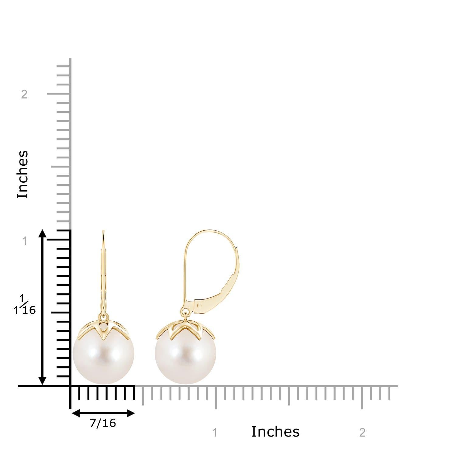 The classic white of the two round peg-set Freshwater cultured pearls is sure to allure. Crafted in 14K yellow gold, these dangling pearl earrings will give you a polished look for the day as well as the night. Match these pearl ball drop earrings