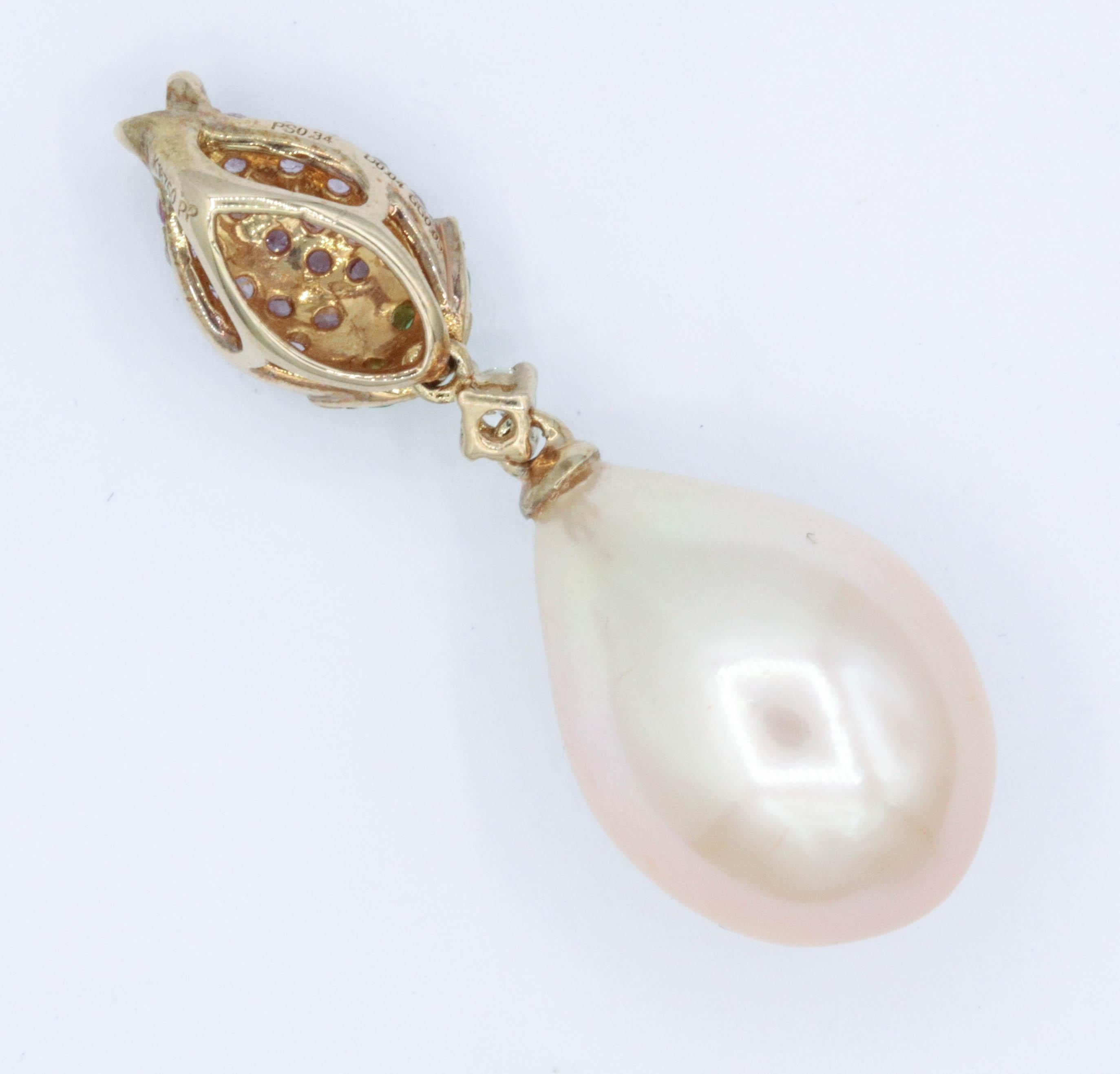 11.8 mm pearl
18K yellow gold
1.25