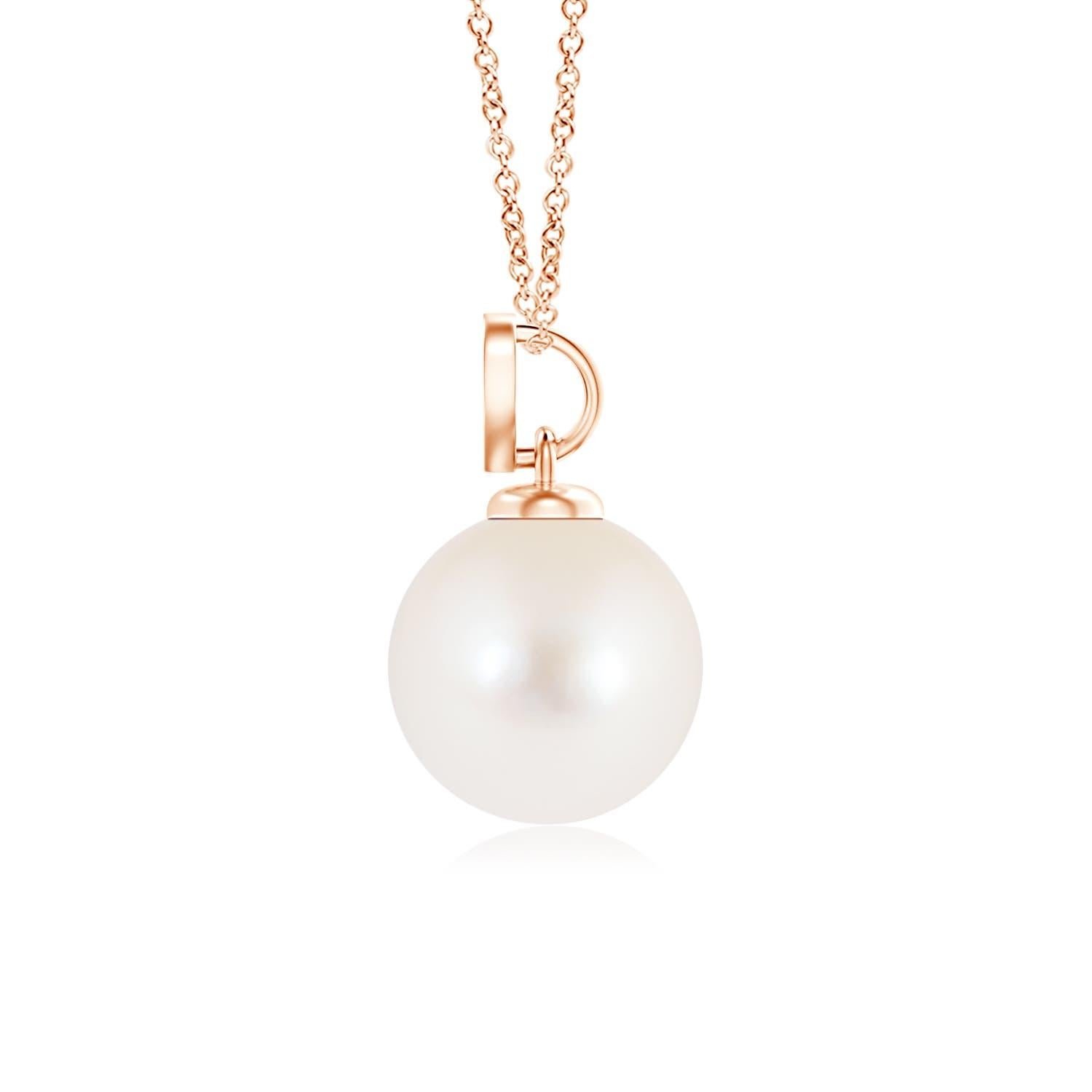 Niente è più indicativo dell'amore di questo affascinante ciondolo a forma di cuore con diamante in oro rosa 14K. Presenta una perla rotonda d'acqua dolce che illumina con la sua deliziosa tonalità, mentre il motivo del cuore tempestato di diamanti