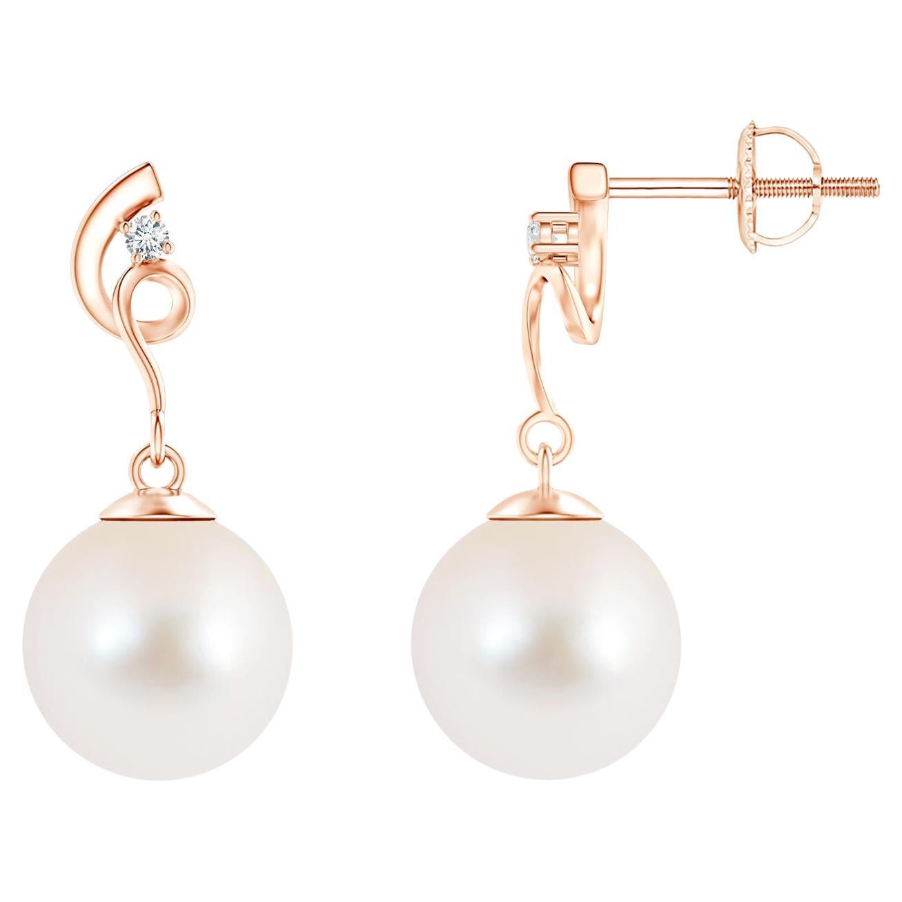 Boucles d'oreilles torsadées en perles de culture d'eau douce avec diamant en or rose 14K en vente