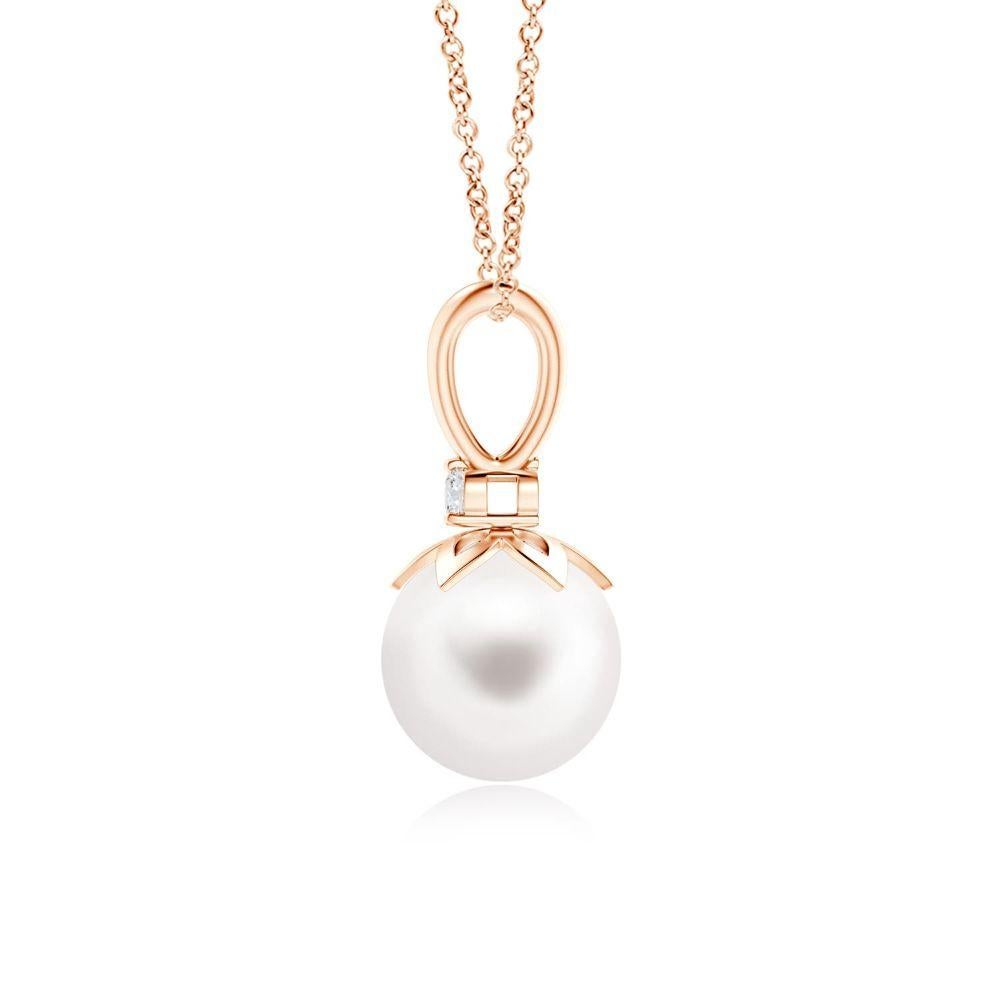 Hanging from a V-bale, the peg-set round Freshwater cultured pearl allures with its classic white color. Right below the bale sits a prong-set diamond accent that adds to the beauty of this drop pearl pendant. Be it your formal or casual outfits,