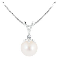 Ciondolo a forma di balla di perle coltivate d'acqua dolce con diamante in oro bianco 14 carati