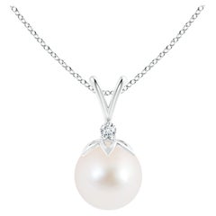 Ciondolo a forma di balla di perle coltivate d'acqua dolce con diamante in oro bianco 14 carati