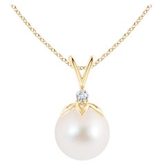 Colgante de perla cultivada de agua dulce en V con diamante en oro amarillo de 14 quilates