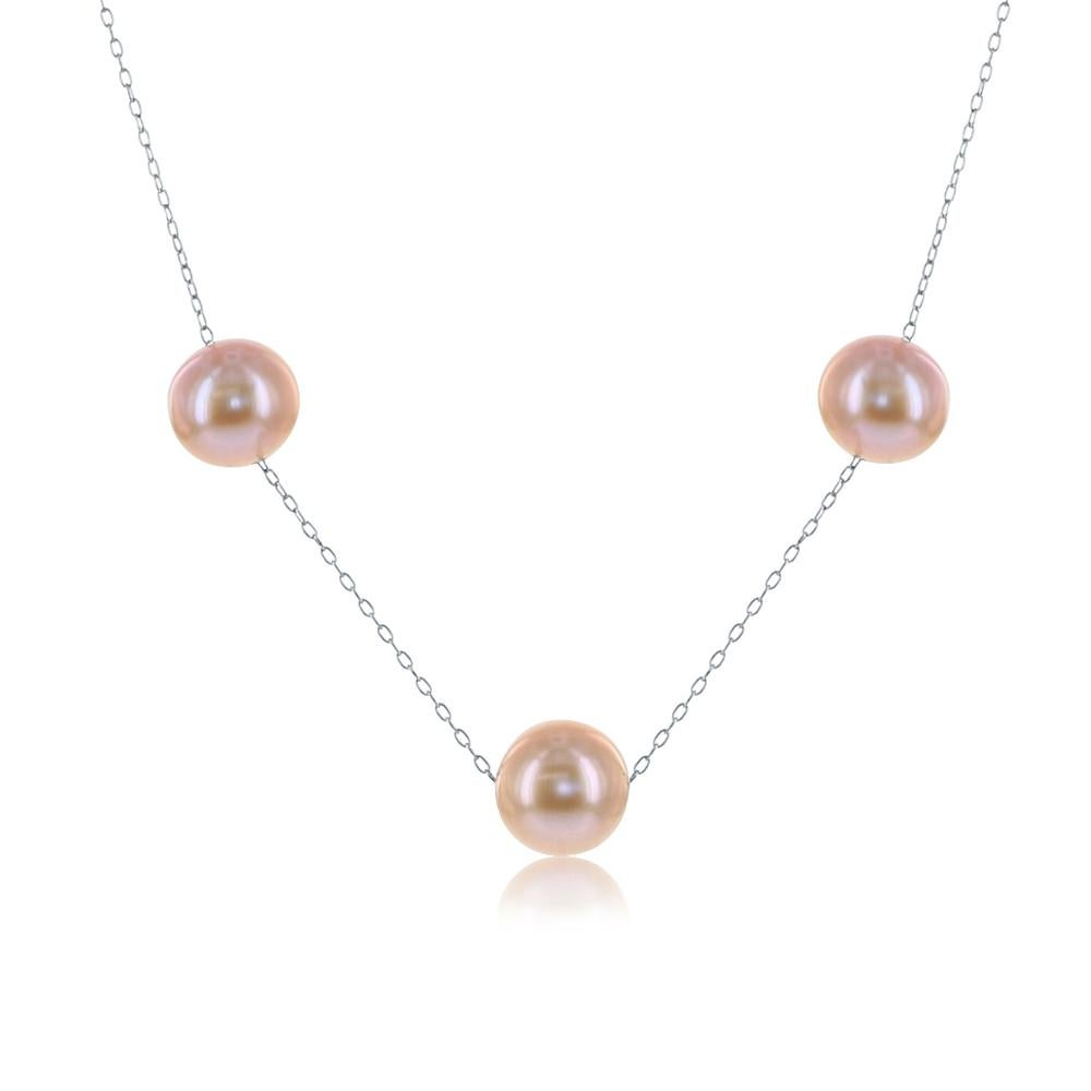 This sterling silver tin-cup style necklace features round, cultured freshwater natural color pink pearls. The finished necklace measures 18 inches, while the pearls measure 9.5-10mm. 