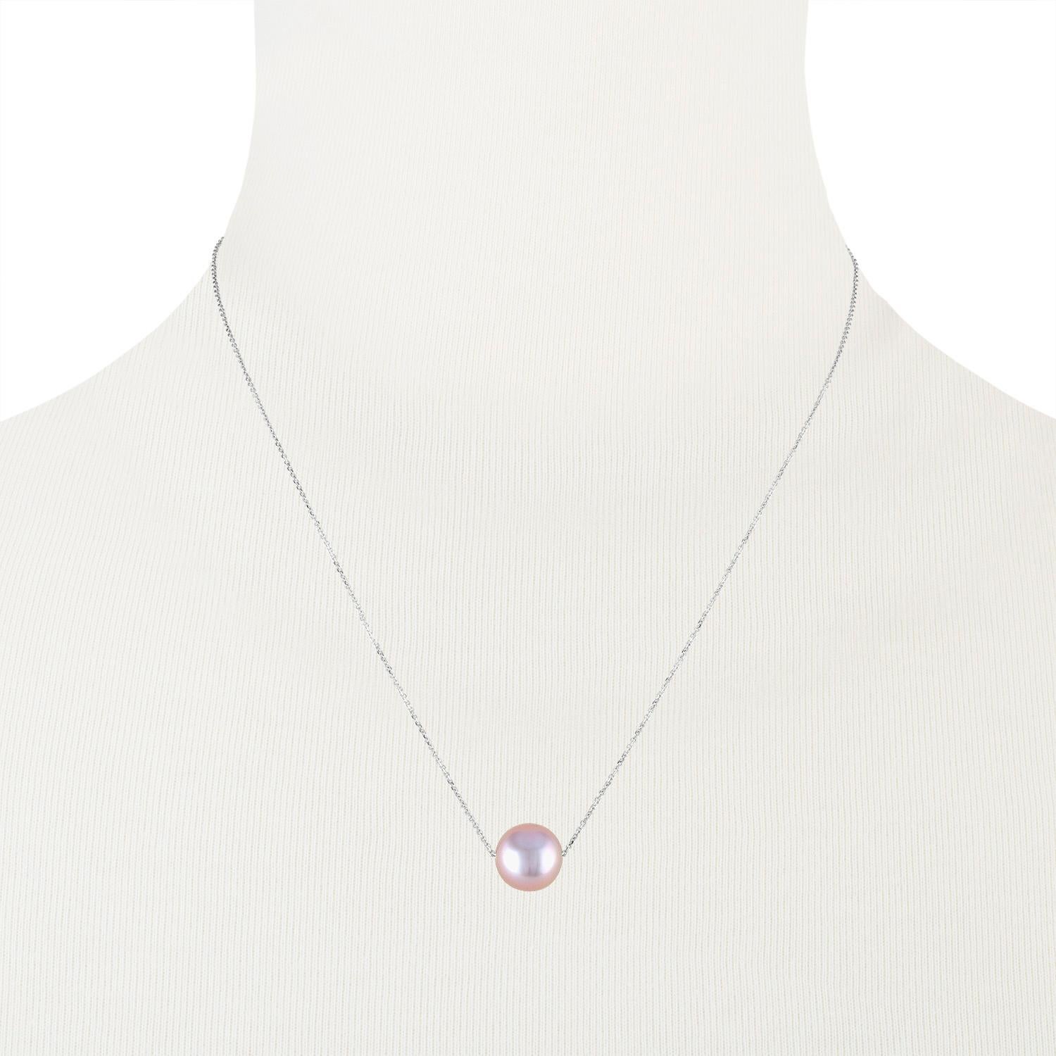 This simple yet elegant pendant features a beautiful, intense, natural-colored, round Chinese Freshwater pink cultured pearl on a 14k White Gold adjustable length chain. The pearl measures 10.7mm and the chain can be adjusted to as long as 18