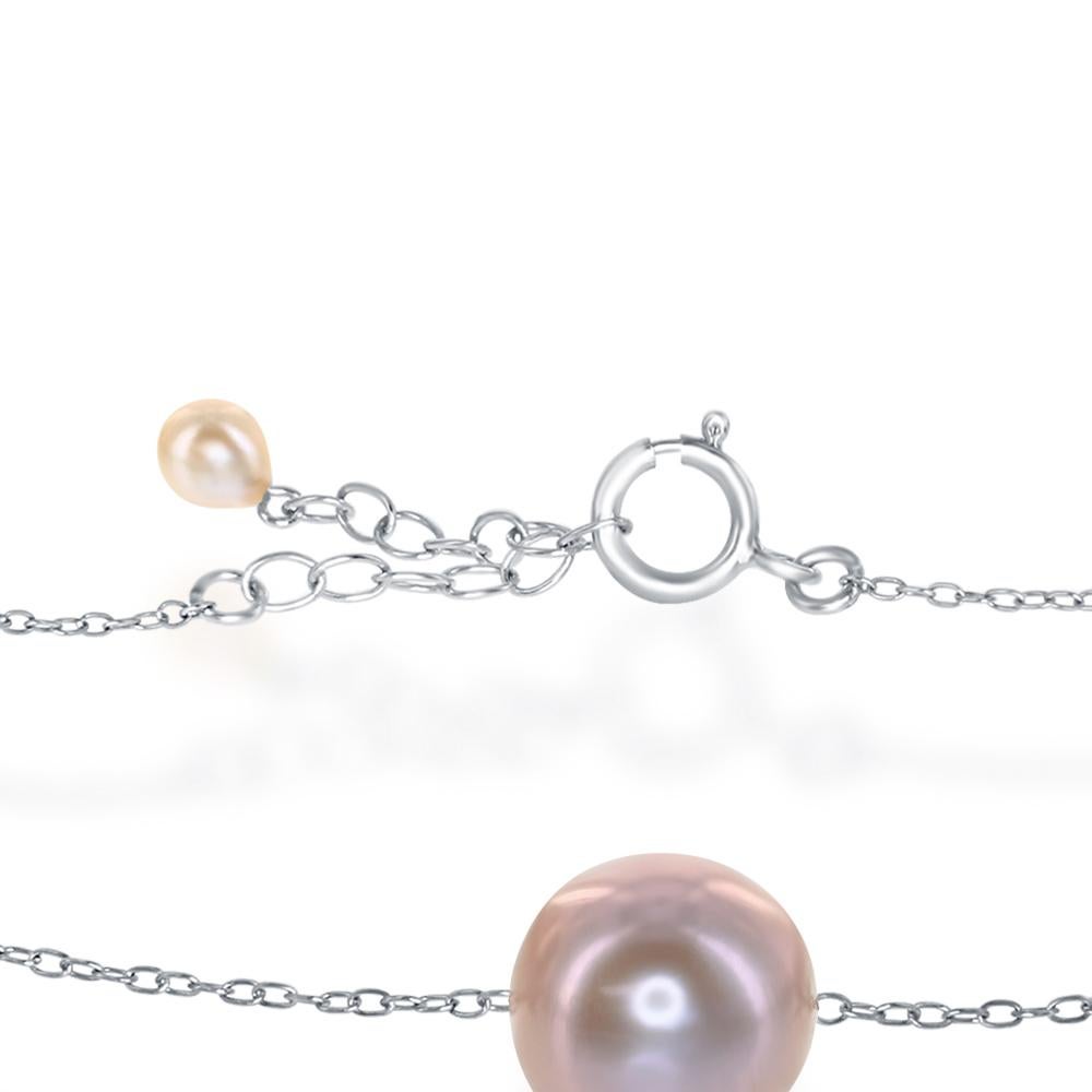 This tun-cup style sterling silver bracelet features cultured freshwater, natural color pink, round 9.5-10mm pearls. The bracelet fits either a 7 or 8 inch wrist. 