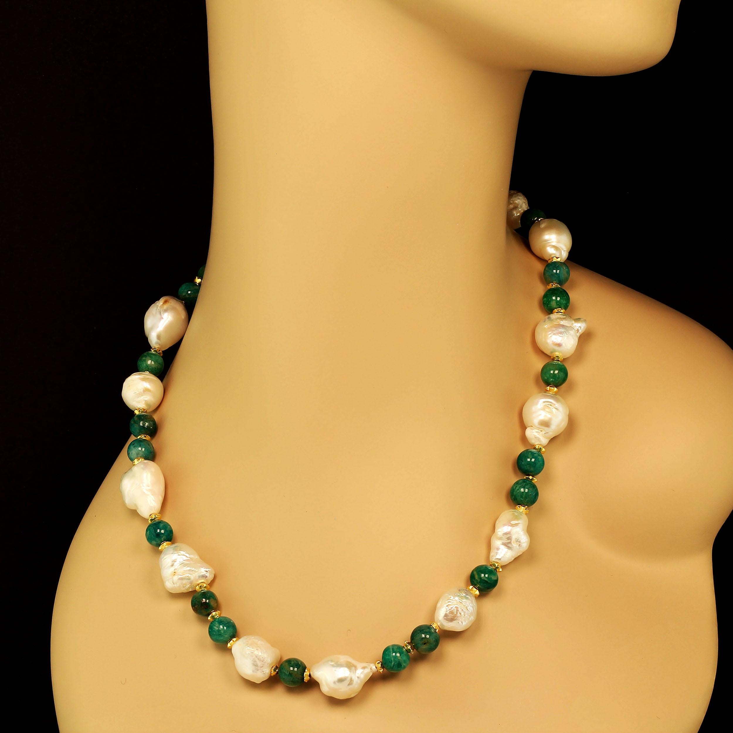 Own the jewelry you deserve

Custom made, fun and funky necklace of white Freshwater Pearls and highly polished 8 MM Amazonite.  It's an unbeatable combination in this 28 inch necklace.  The Pearls and Amazonite have gold tone accents and this