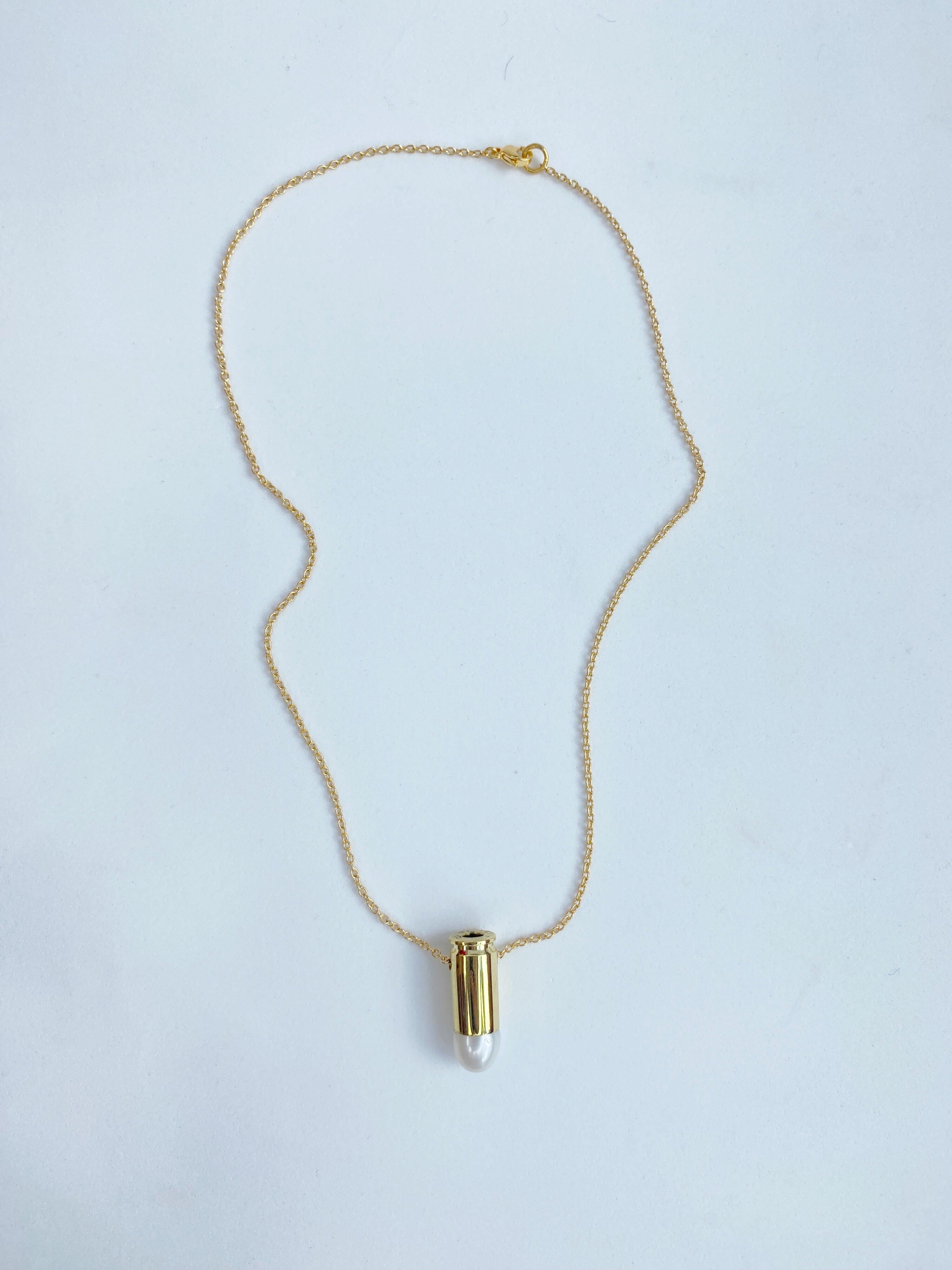 gold bullet pendant