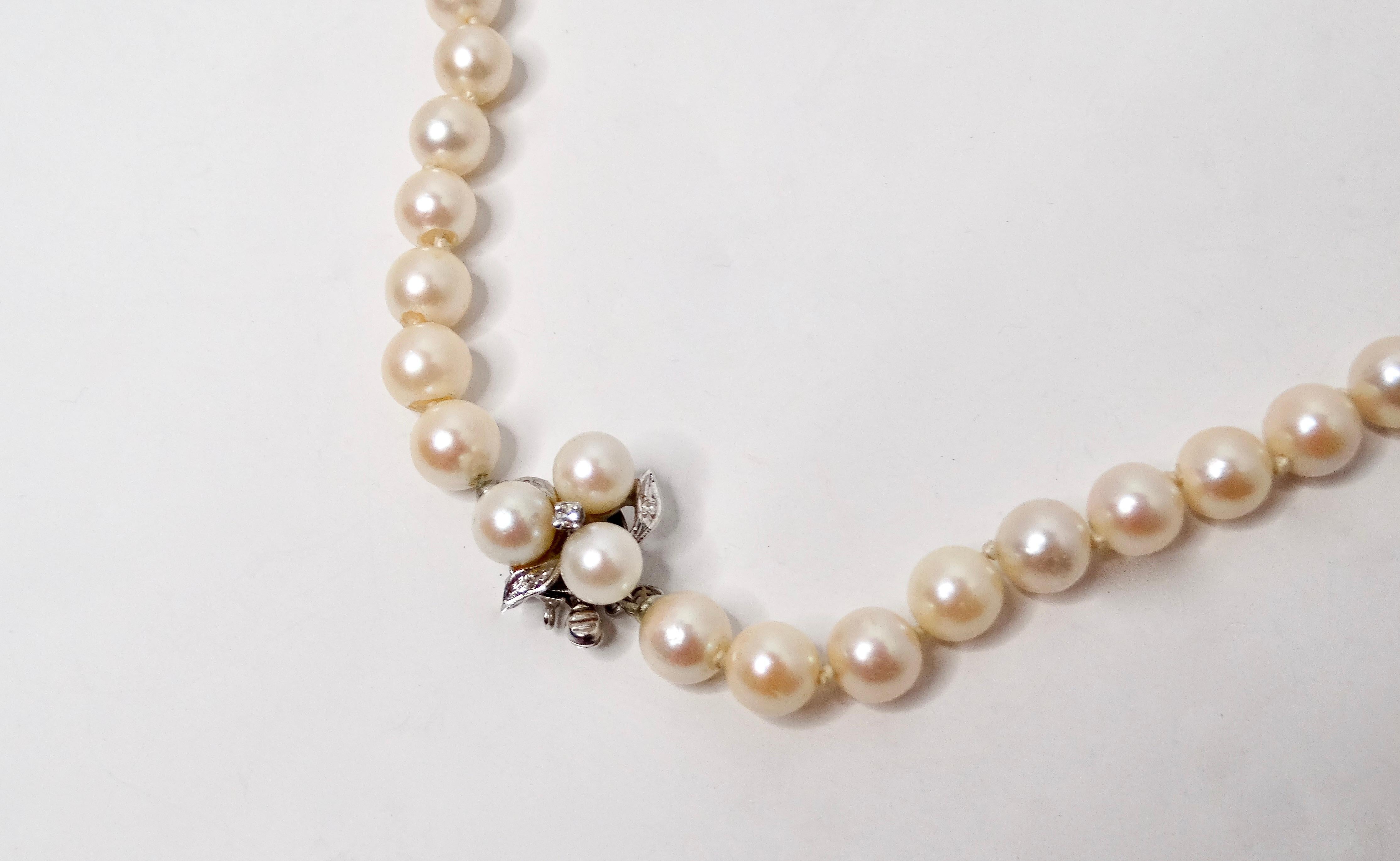Introducing the elegant Pearl Beaded & 14k White Gold Necklace, an exquisite accessory that exudes sophistication with its stunning floral pearl charm clasp. The necklace features lustrous pearls that shimmer with every movement, creating a timeless