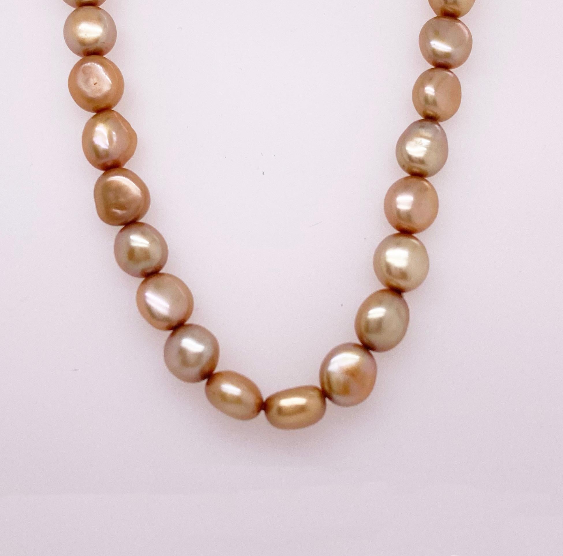 This 42 inch pearl necklace is perfect to sling around your neck as many times as you want! Stylish and fashionable, you will feel great while wearing these pearls. The pearls have a gold to brownish color. The details for this beautiful necklace