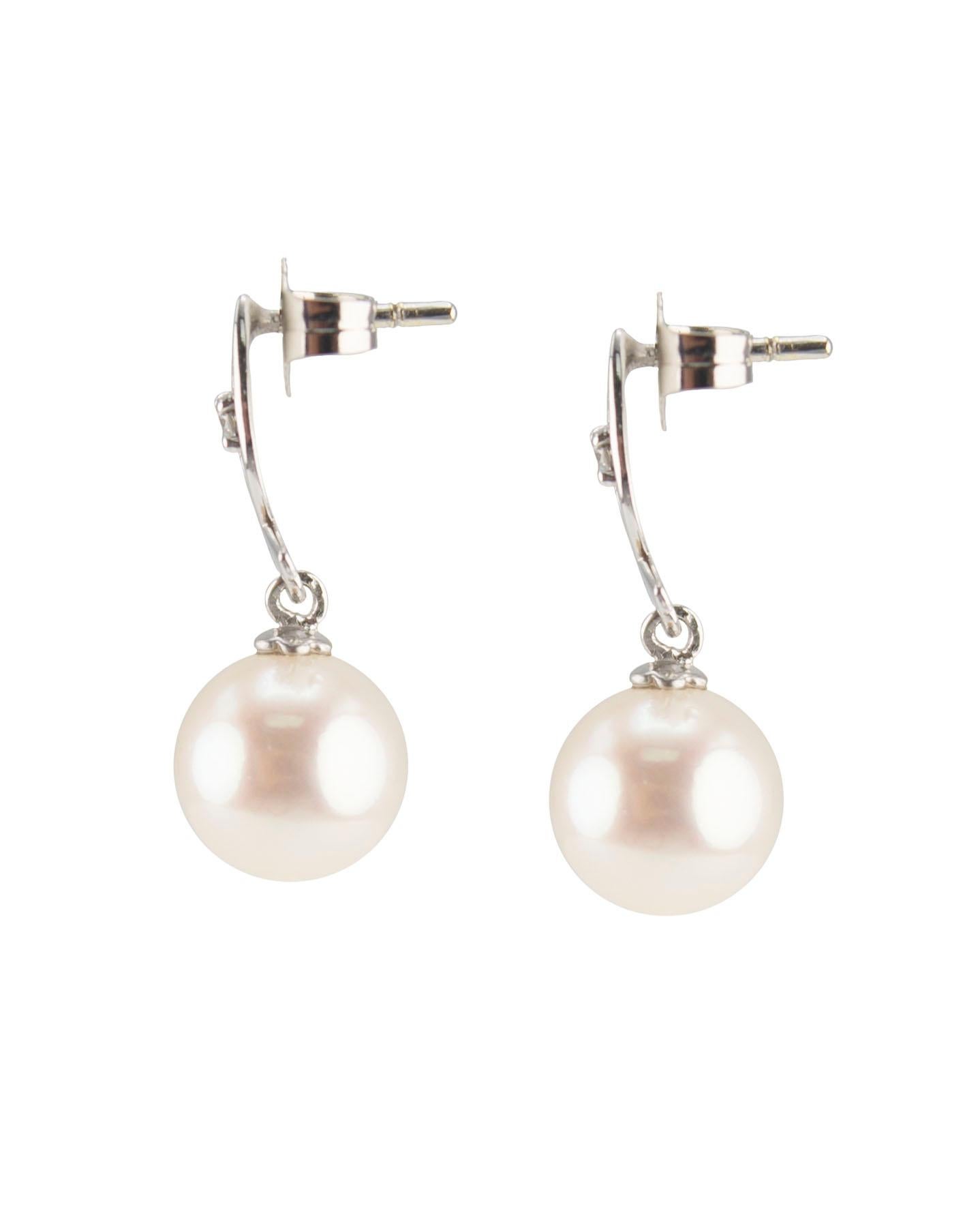 Stunning 14K White Gold fish earrings with 8-8.5mm Freshwater White Pearl and .04ctw Diamond. Perfect for any occasion!