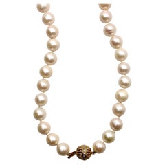 Collana di perle d'acqua dolce con dettagli in oro 14k e diamanti circa anni '50
