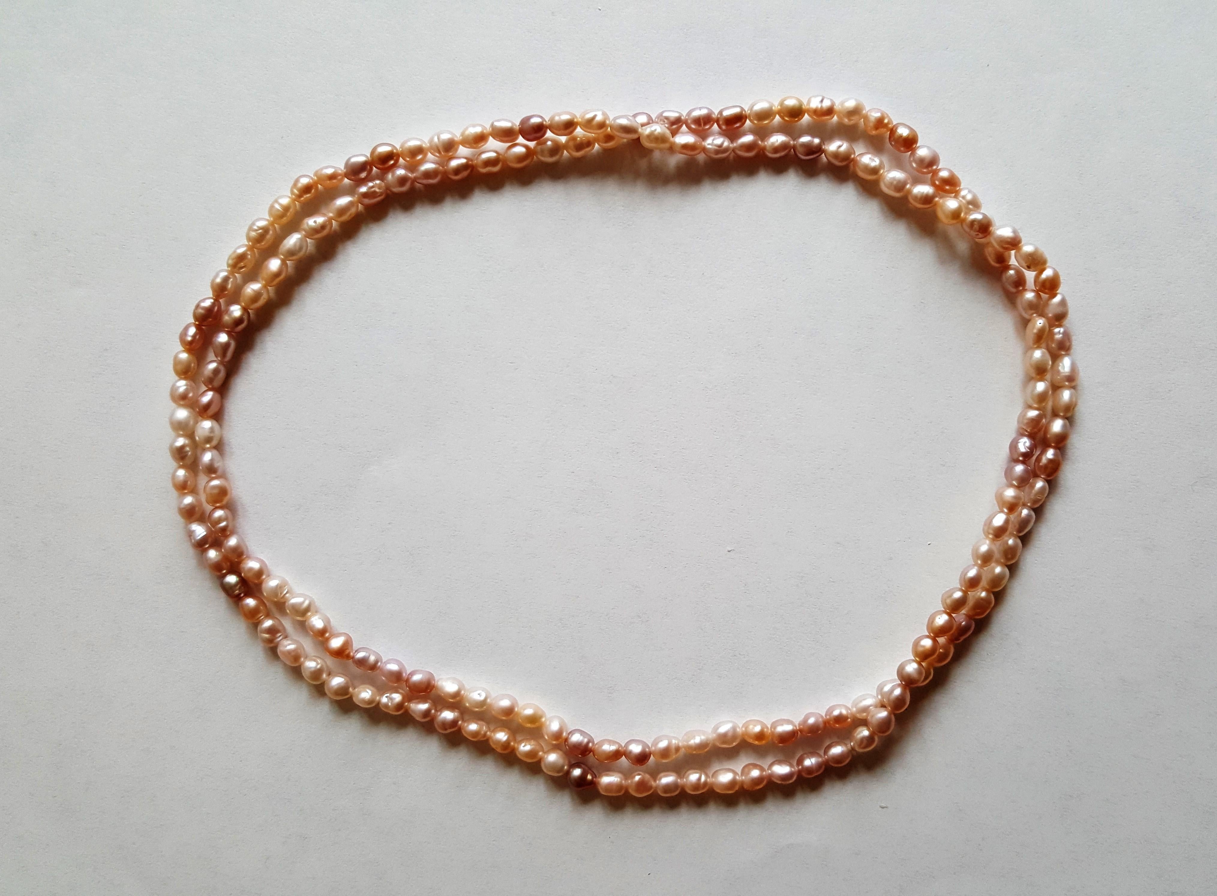 A beautiful strands freshwater pearl stand that's 31 inches in length with shades of pink peach that have a very good luster and nacre. The pearls are  4.2mm in diameter.

These pearls make a beautiful double strand and classic and timeless addition